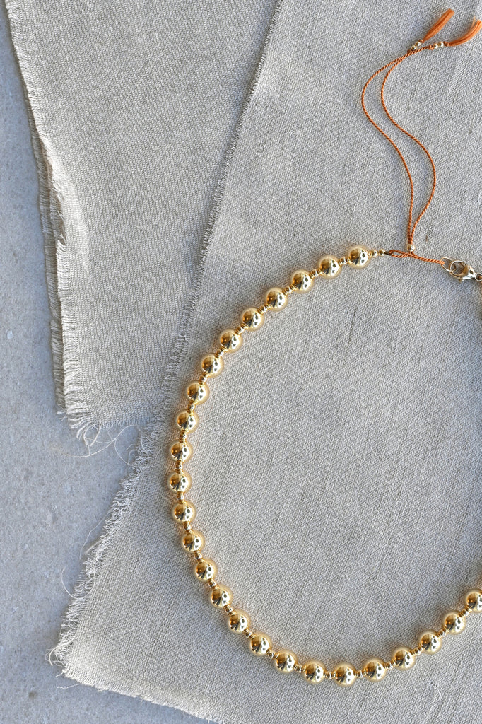 Moon Sun Necklace with Clay Silk Cord at Abacus Row Handmade Jewelry