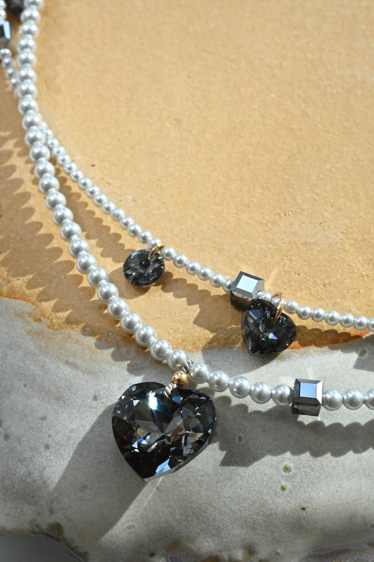 Styled Detail of the Moonstruck Big Heart Necklaces at Abacus Row Handmade Jewelry