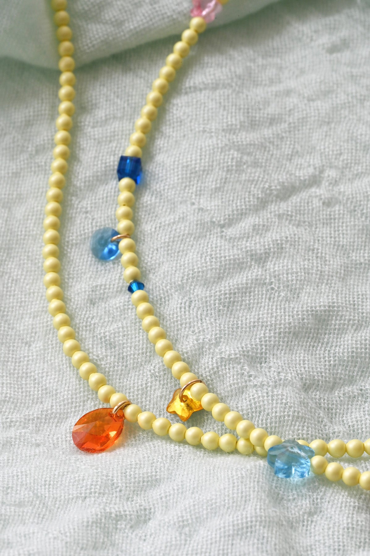 Lucky Charms and Sun Kissed Necklaces by Abacus Row Handmade Jewelry