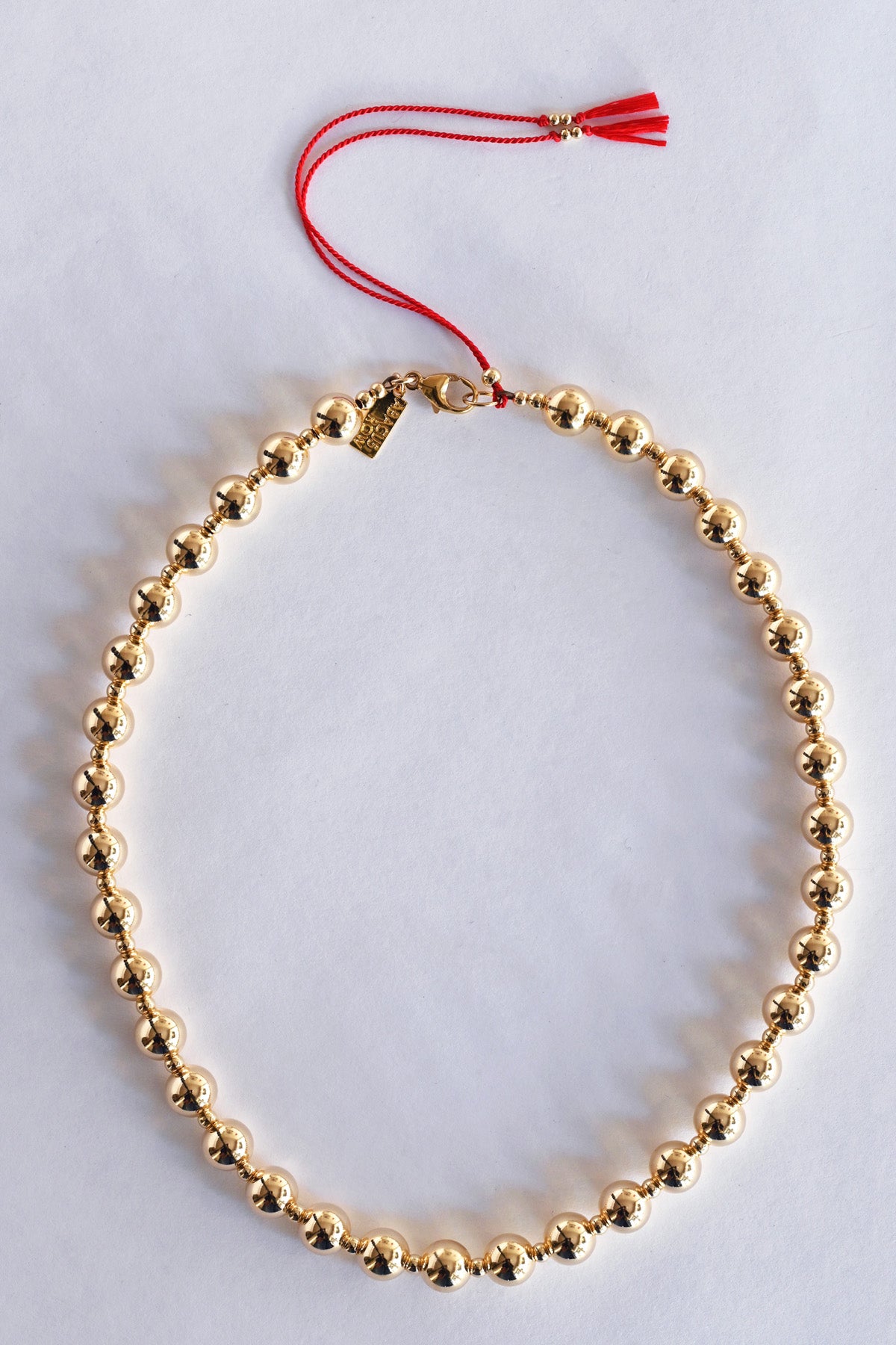 Moon Sun Necklace with Red Tassels by Abacus Row Jewelry