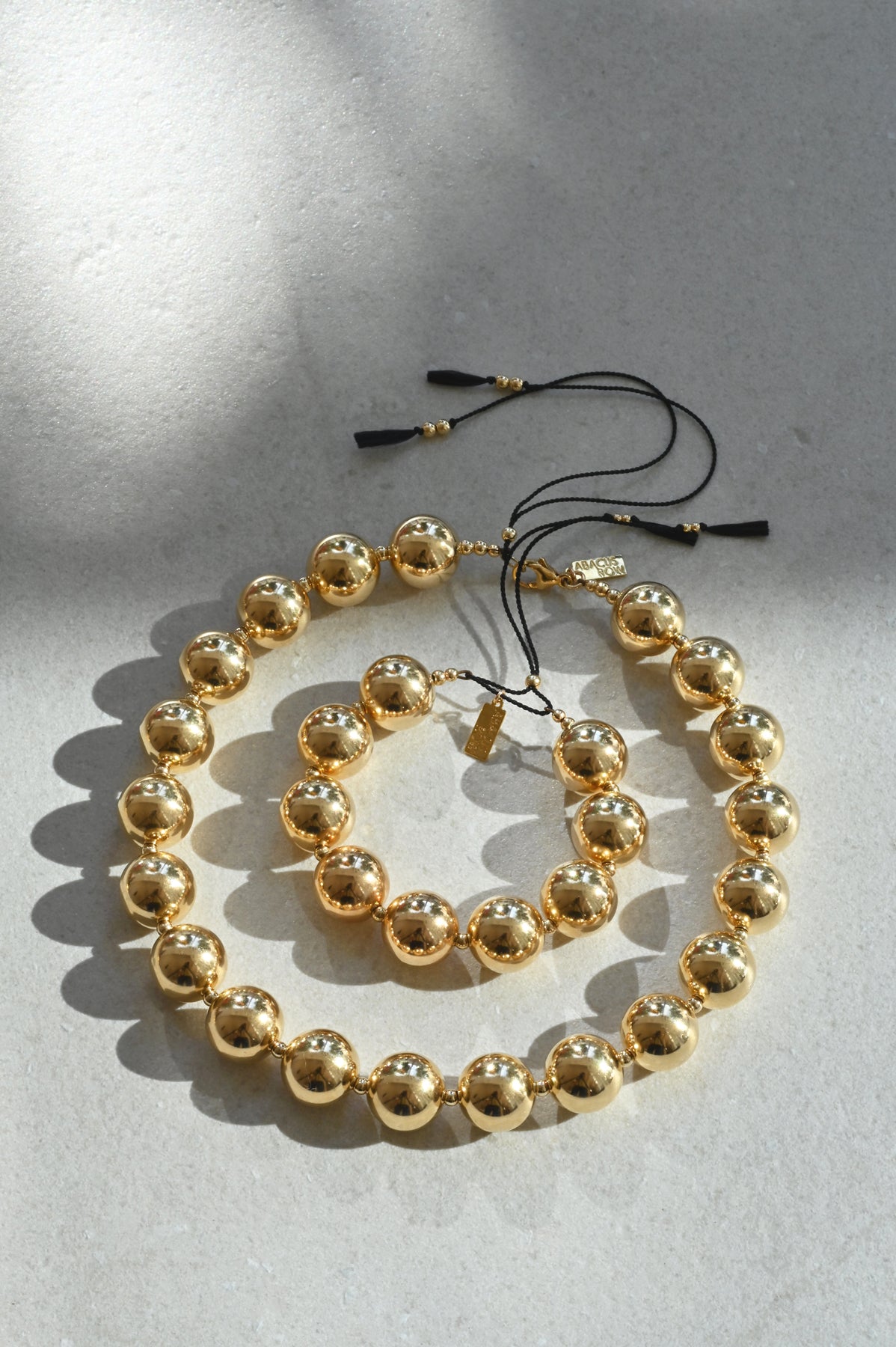 Yuan Yuan Necklace and Bracelet with Black Tassels by Abacus Row Handmade Jewelry