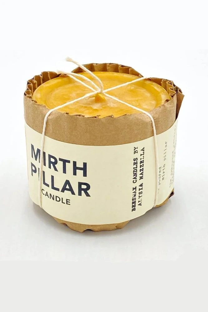 Packaged Mirth Pillar Candle by Alysia Mazzella at Abacus Row Handmade Jewelry