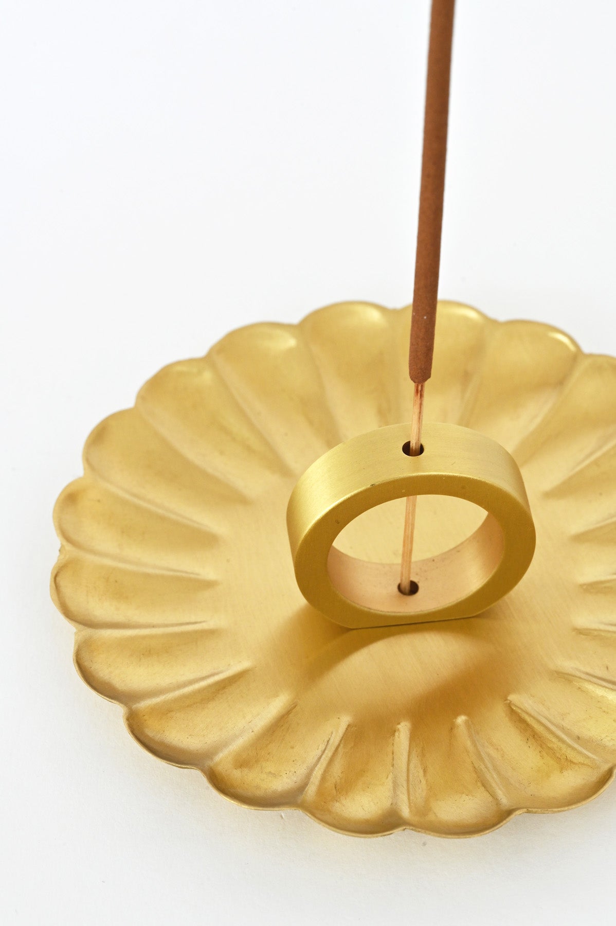 Small Brass Petal Tray Detail by Fog Linen with incense holder at Abacus Row Handmade Jewelry