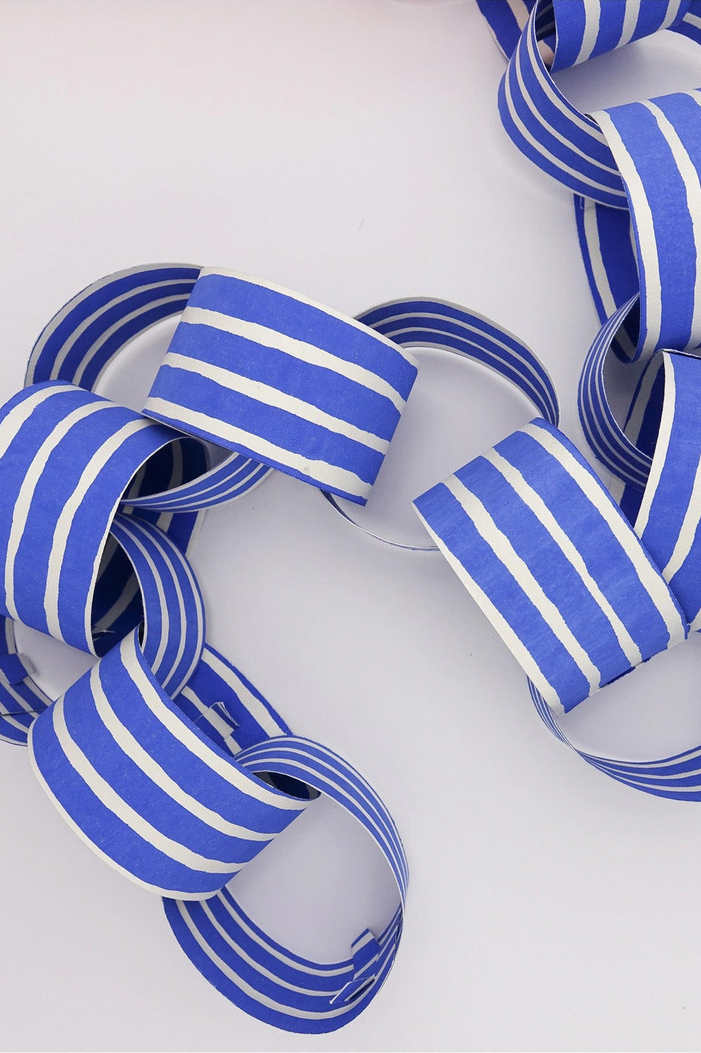 Blue Paper Chain Garland by Hataguchi Collective detail at Abacus Row
