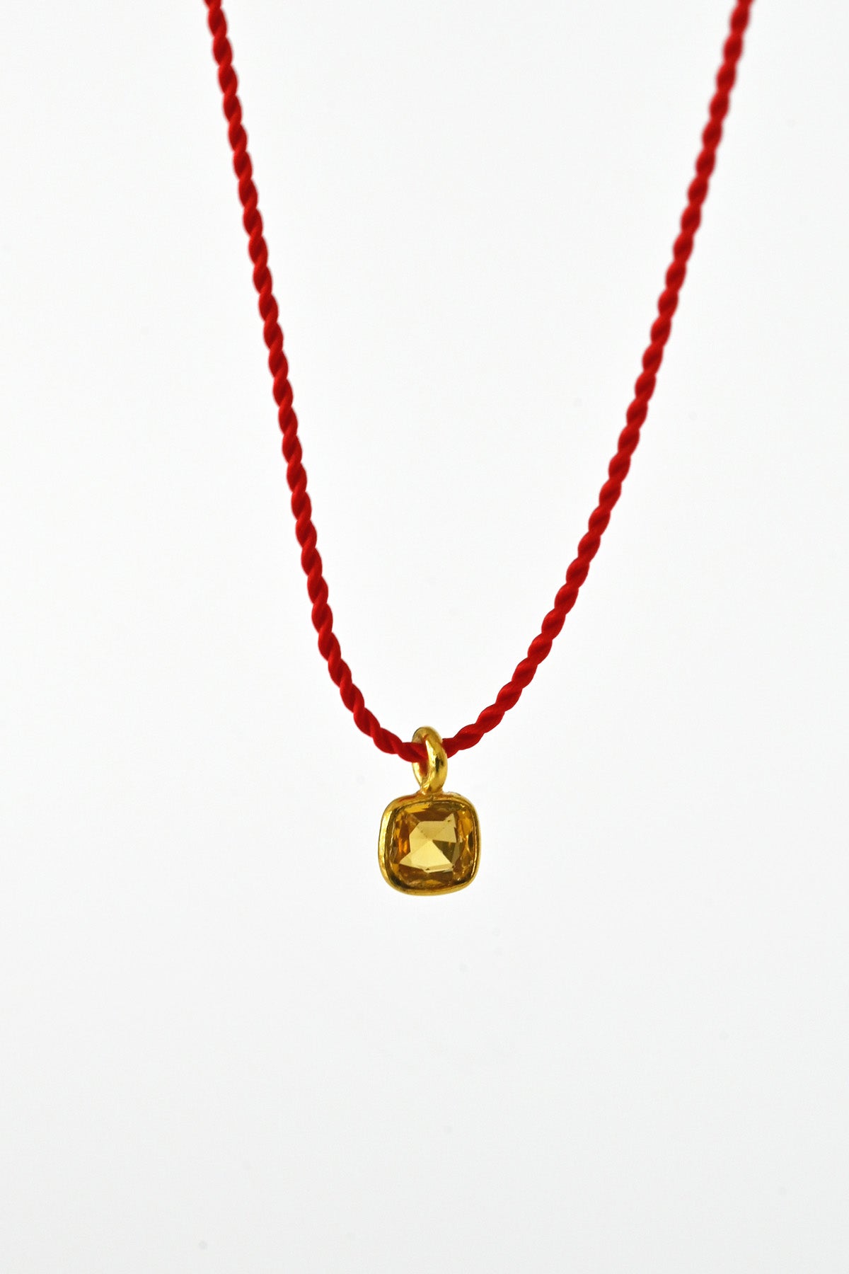 Yellow Sapphire Detail Little Charm Big Luck Necklace at Abacus Row Handmade Jewelry