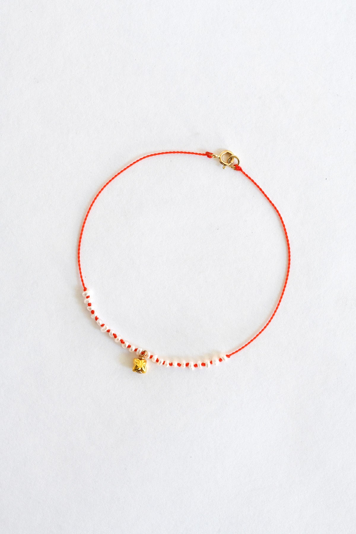 Coral Blossom Charm Bracelet by See Real Flowers at Abacus Row