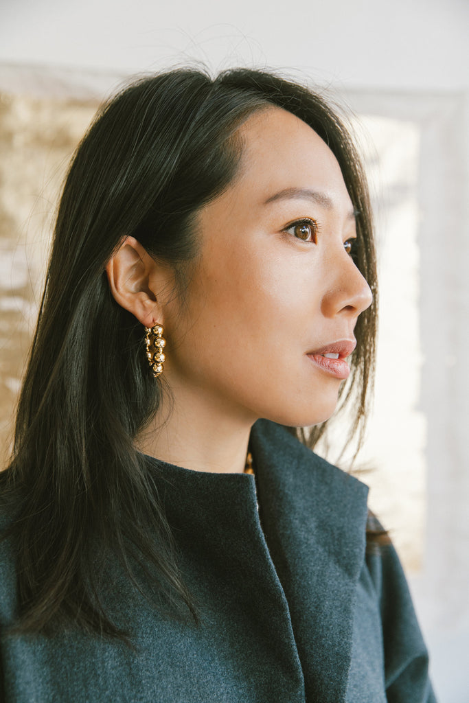 Jiu Jiu Hoop Earrings of the Yuan Yuan Collection modeled at Abacus Row