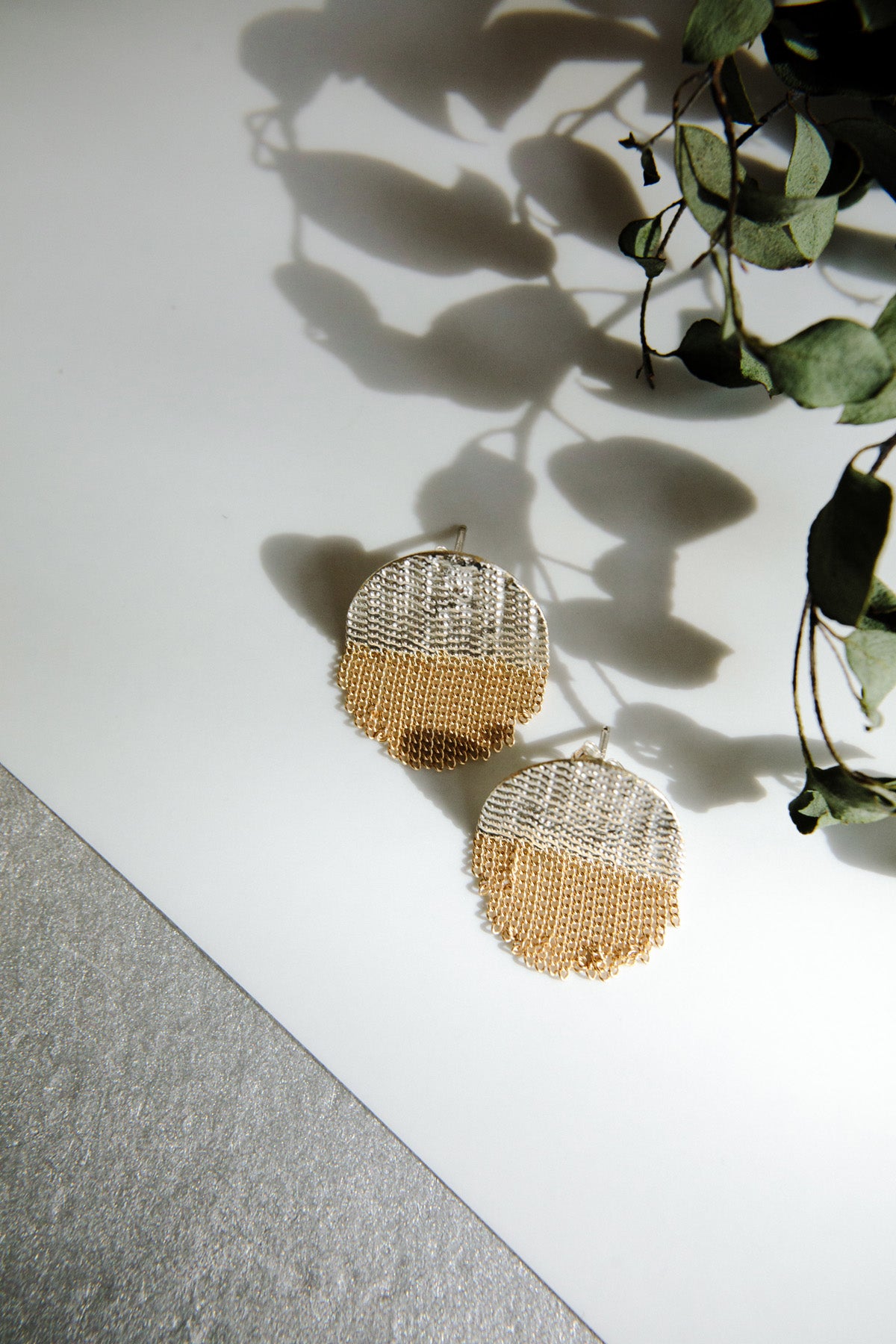 Silver and Brass Half Circle Stud Earrings by Hannah Keefe at Abacus Row Handmade Jewelry