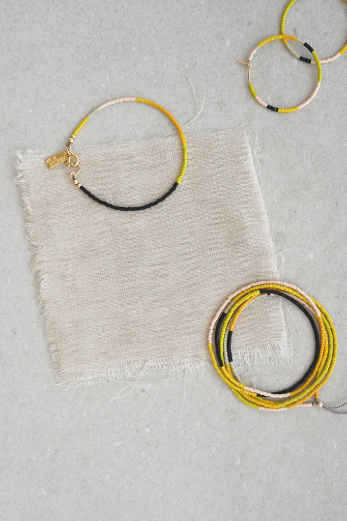 A Yellow Sun Collection styled at Abacus Row Handmade Jewelry