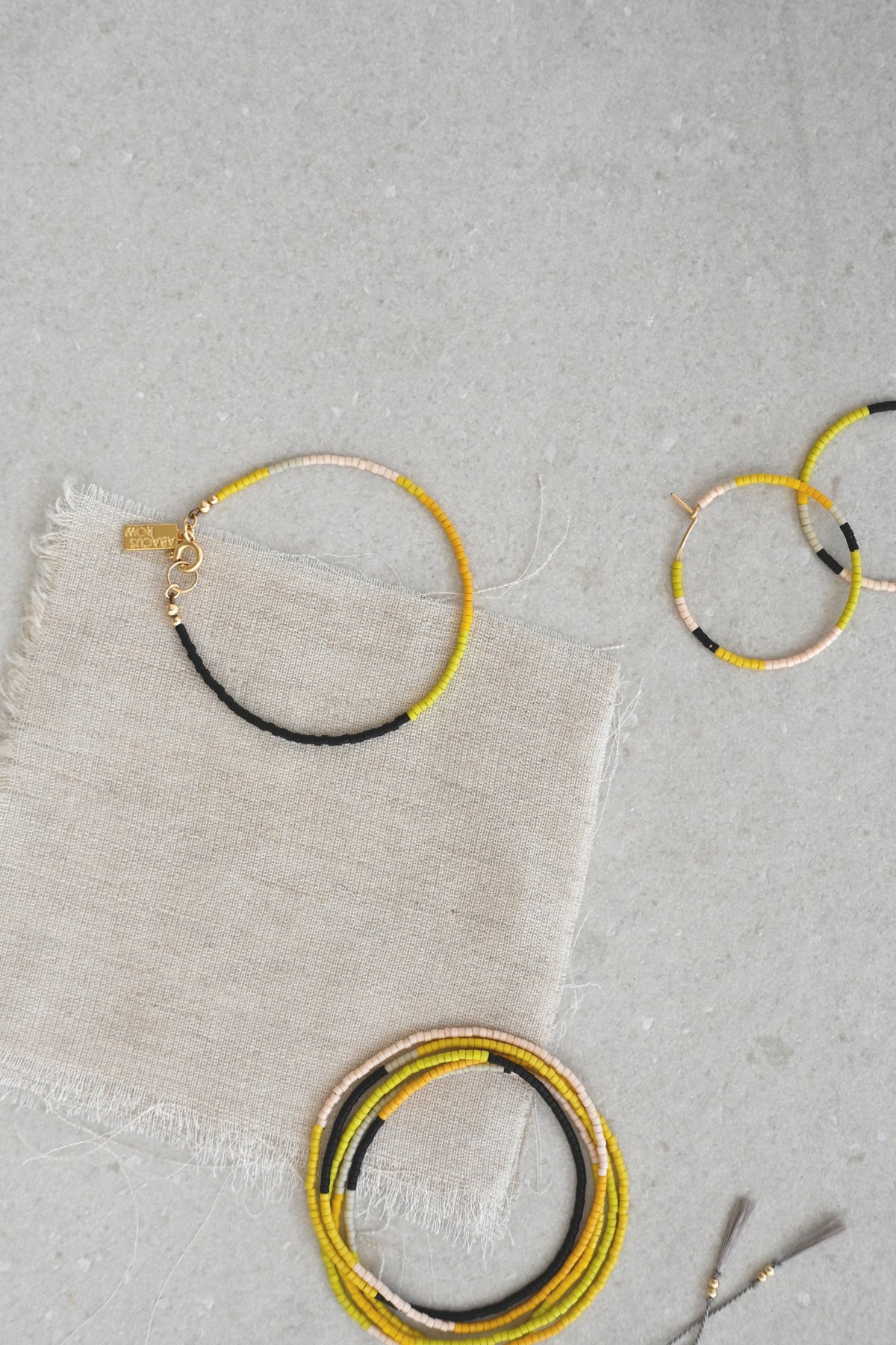 A Yellow Sun collection styled at Abacus Row Handmade Jewelry