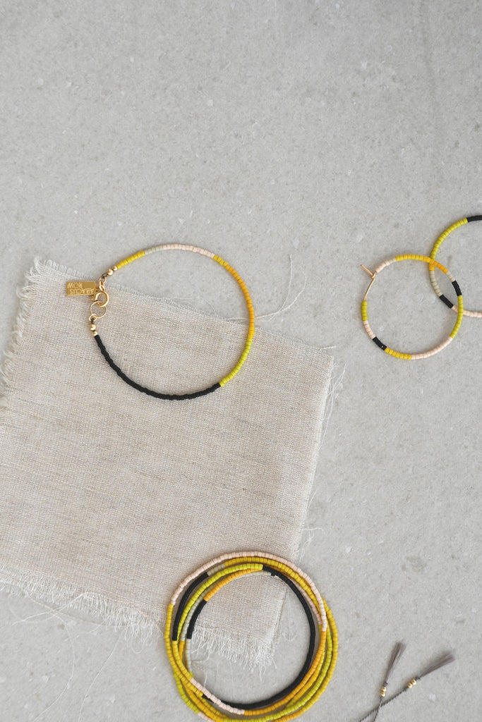 A Yellow Sun collection styled at Abacus Row Handmade Jewelry