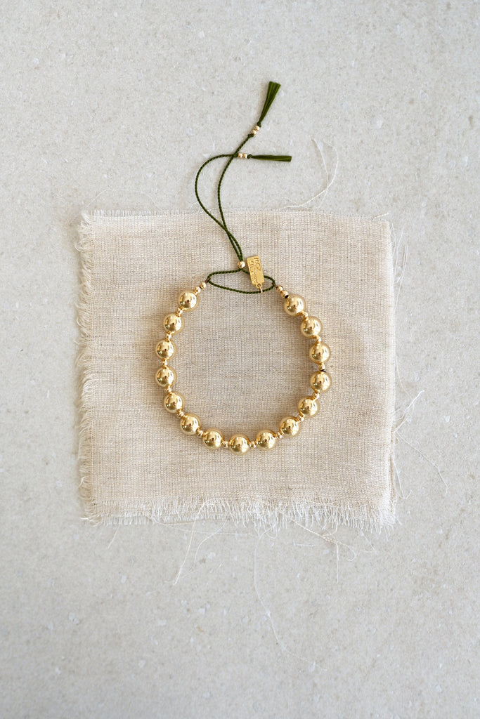 Moon Sun Bracelet with Moss Silk Cord by Abacus Row Handmade Jewelry