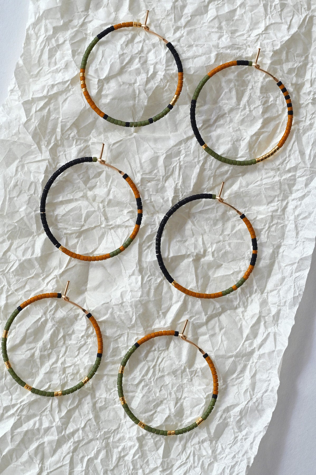 Alluvial Earrings lined up in Knoll by Abacus Row Handmade Jewelry