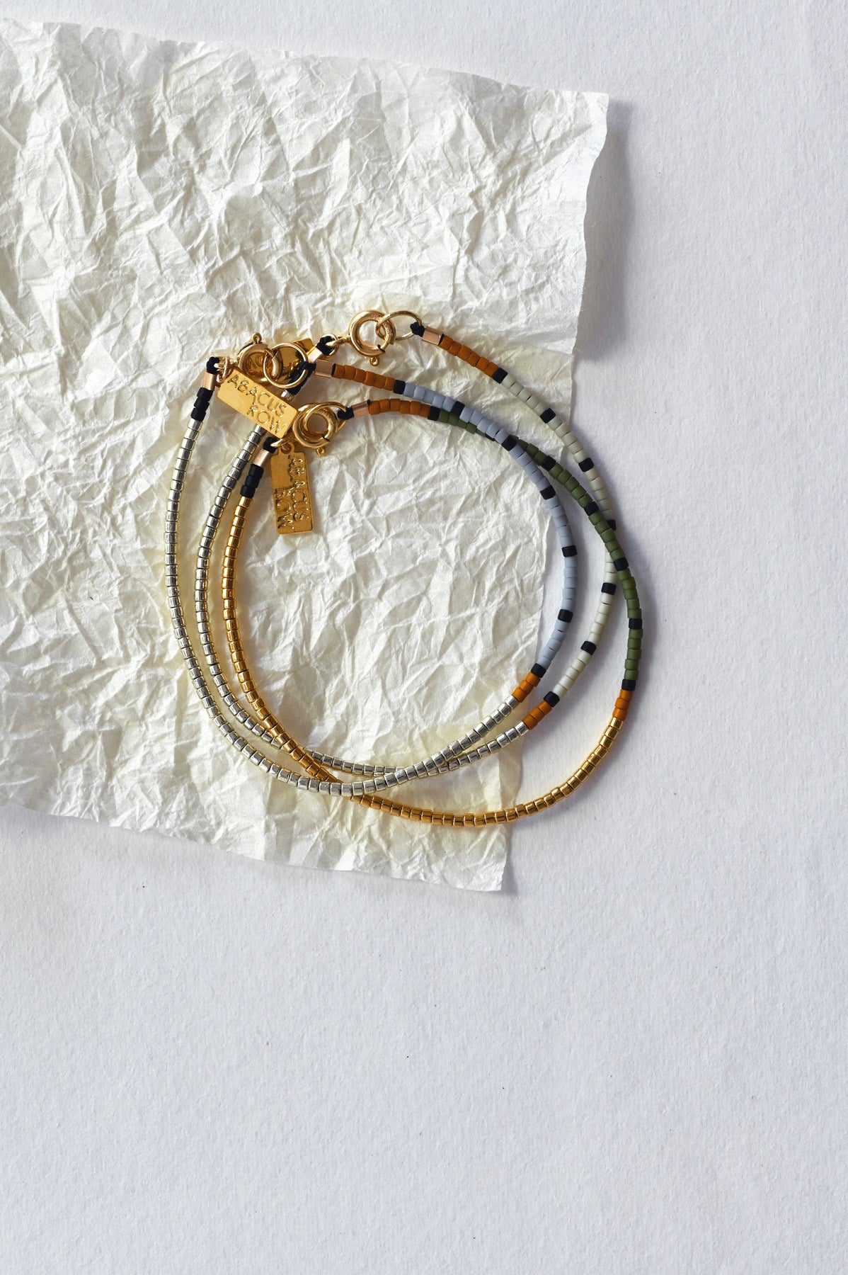 Nootka Bracelets Layered by Abacus Row Handmade Jewelry