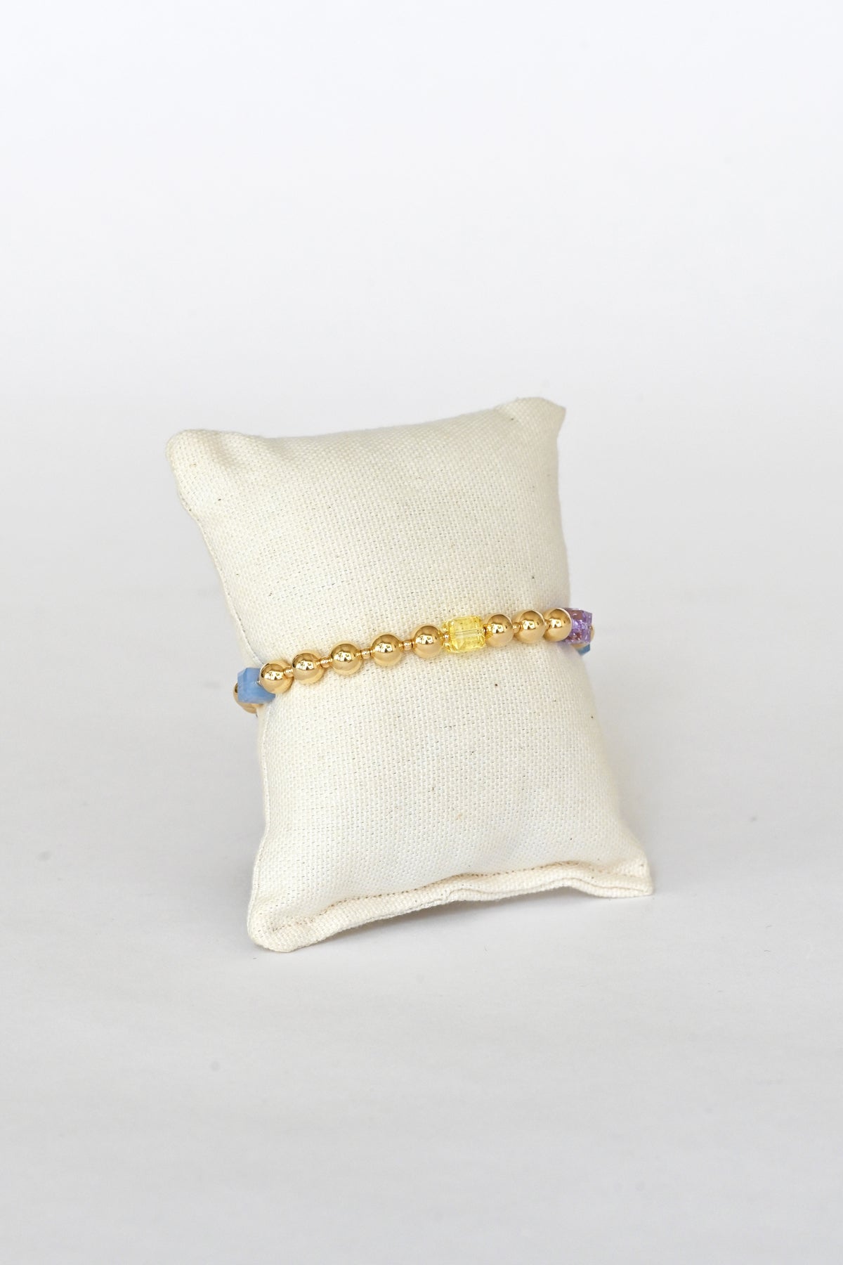 Daisy Chain Bracelet No.2 Garden Collection front view on pillow at Abacus Row Jewelry