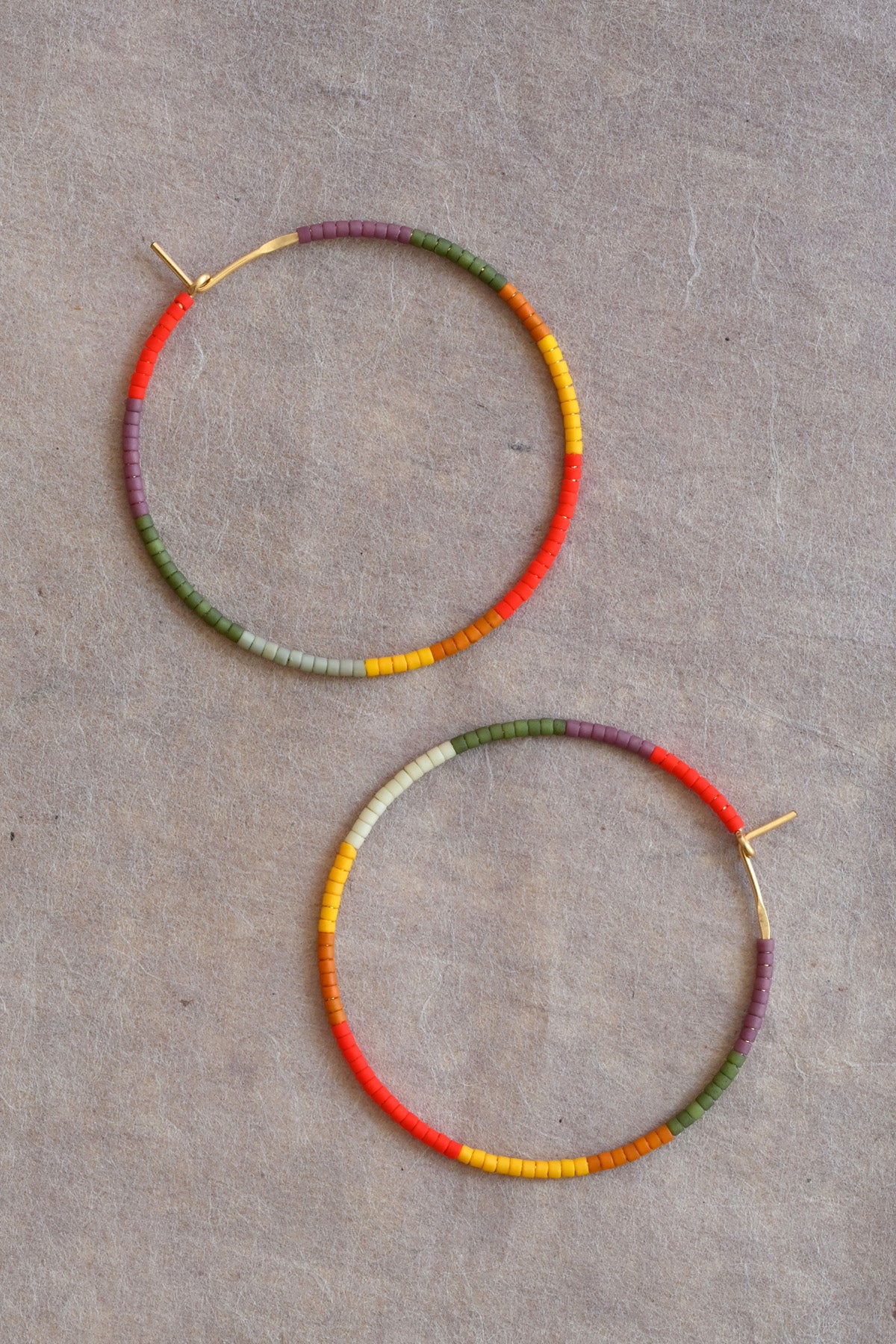 Large Desert Sun Earrings styled at Abacus Row handmade jewelry