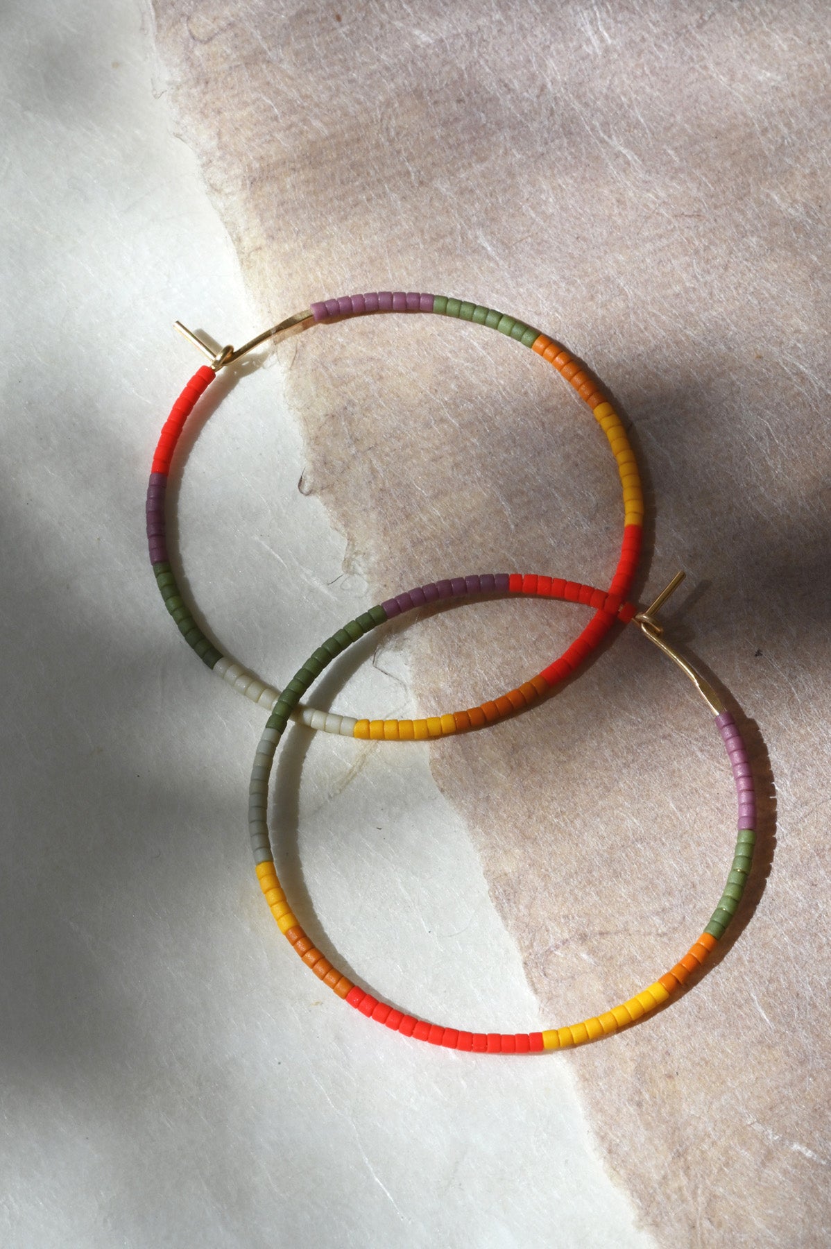 Large Desert Sun Earrings styled at Abacus Row handmade jewelry