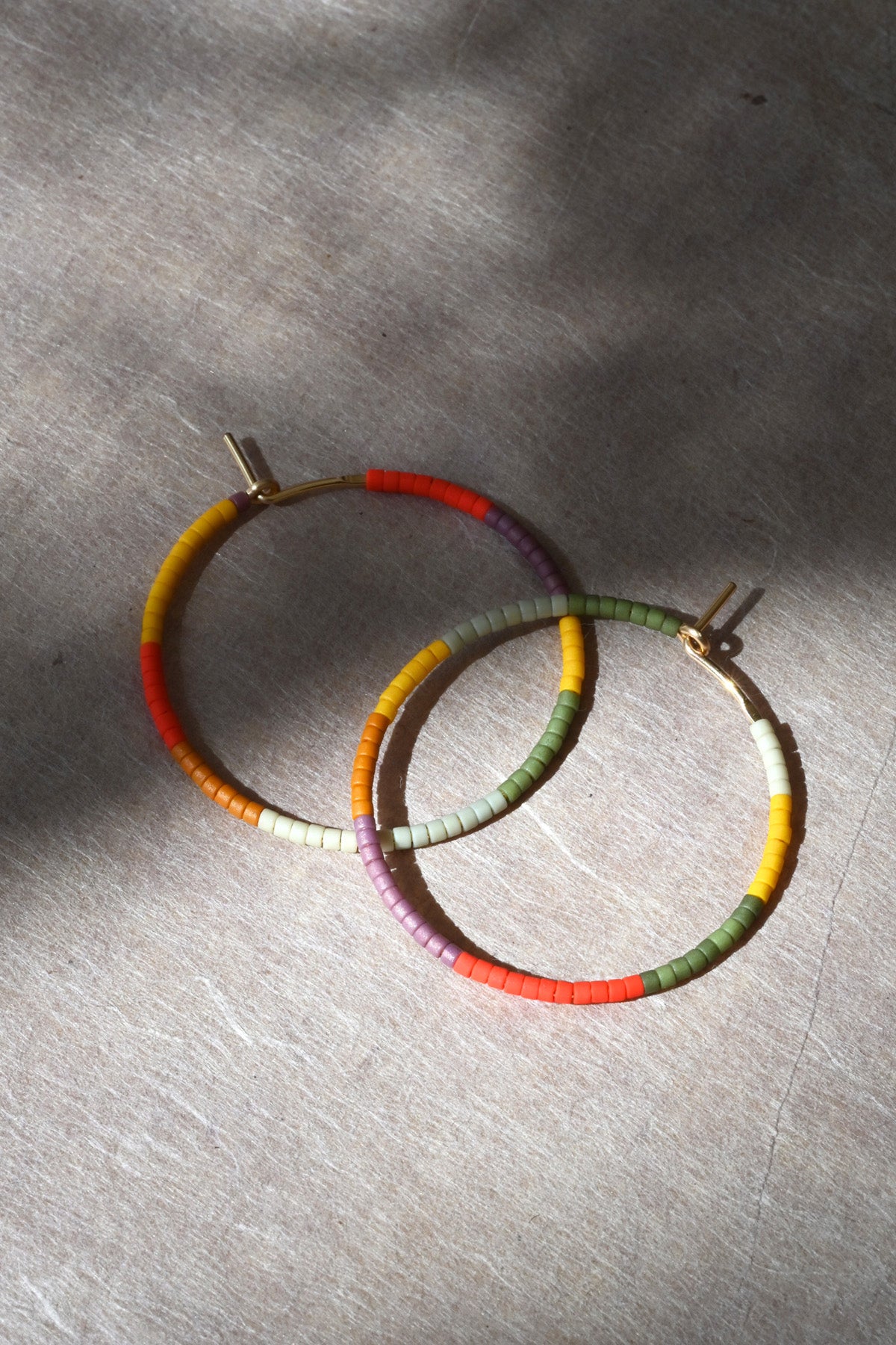 Small Desert Sun Earrings styled at Abacus Row handmade jewelry