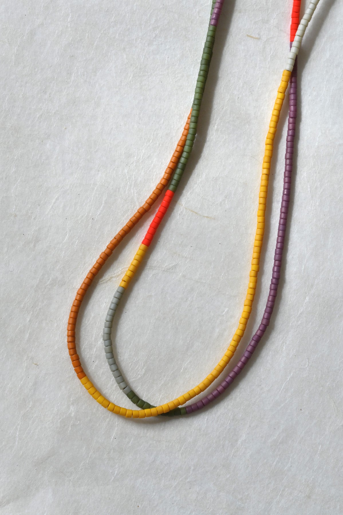 Desert Sun Necklace drape at Abacus Row handmade jewelry