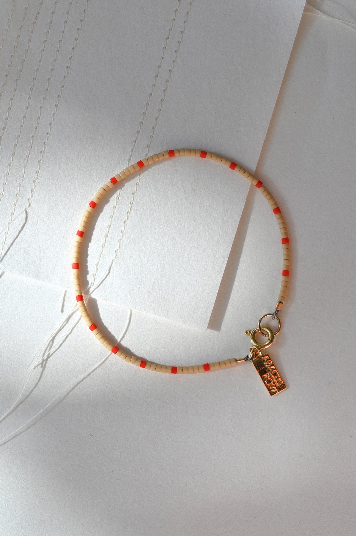 Dipsea Bracelet in Blush and Red at Abacus Row Handmade Jewelry