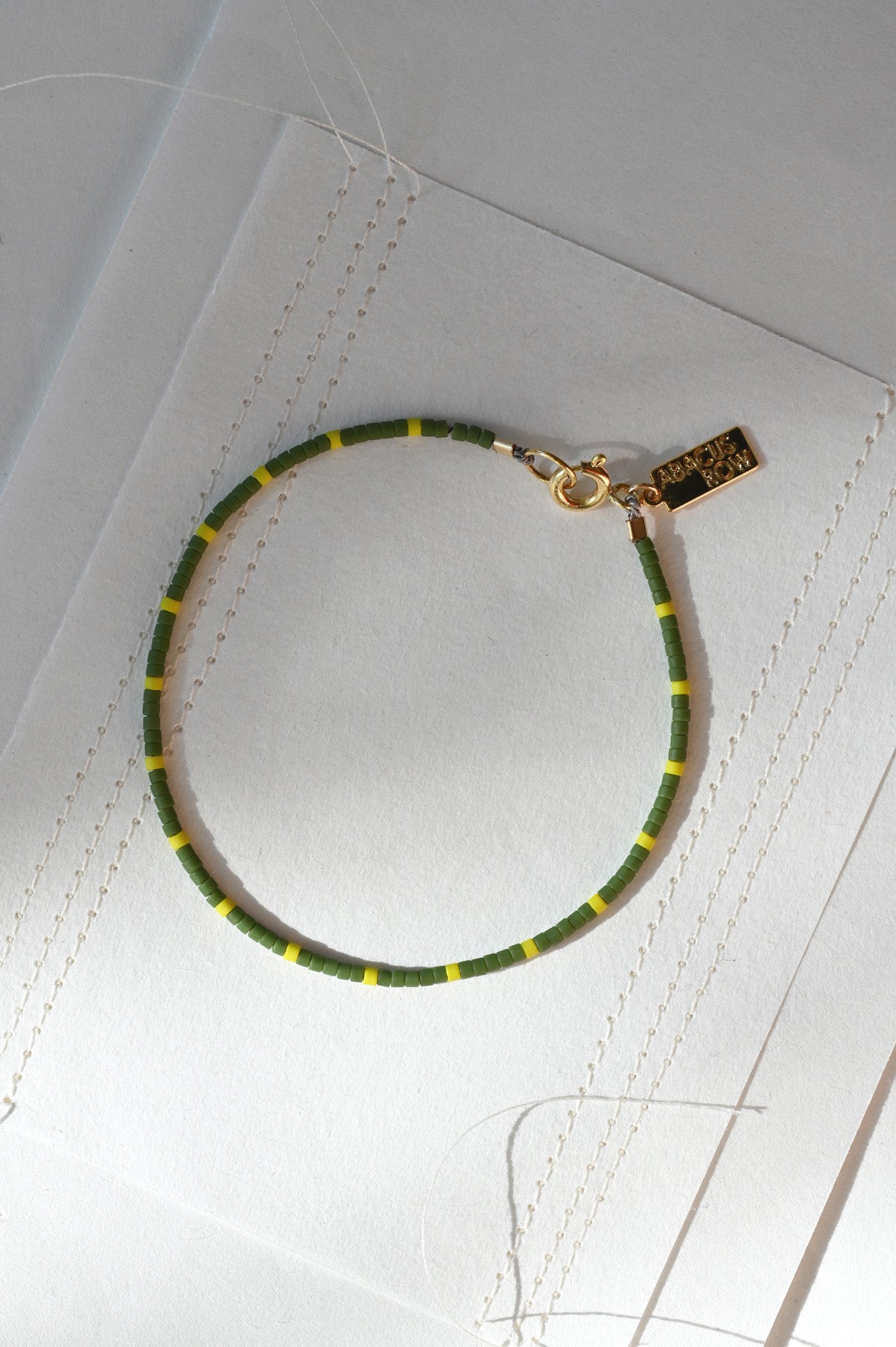 Dipsea Bracelet in Olive and Pollen at Abacus Row Handmade Jewelry