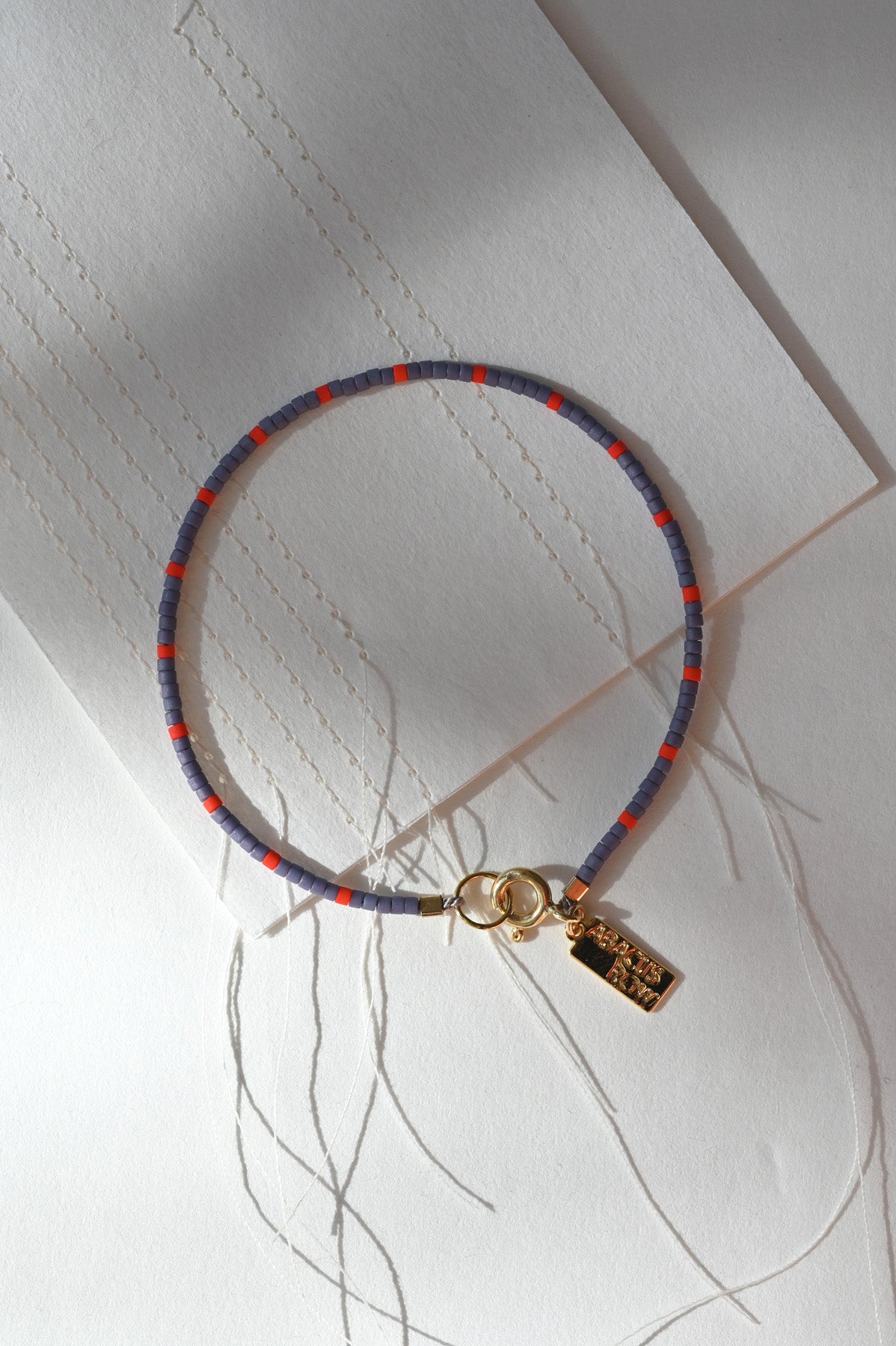 Dipsea Bracelet in Plum and Red at Abacus Row Handmade Jewelry