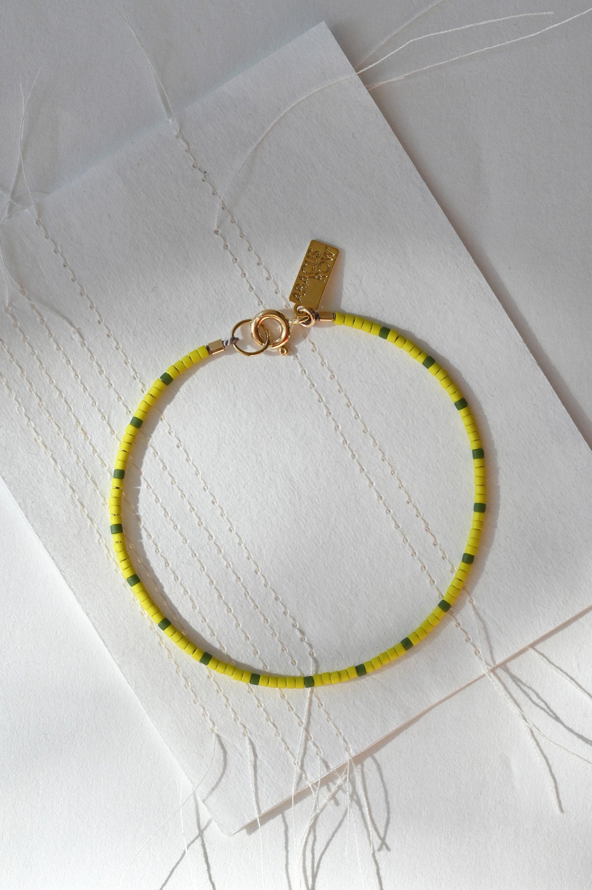 Dipsea Bracelet in Pollen Olive at Abacus Row Handmade Jewelry