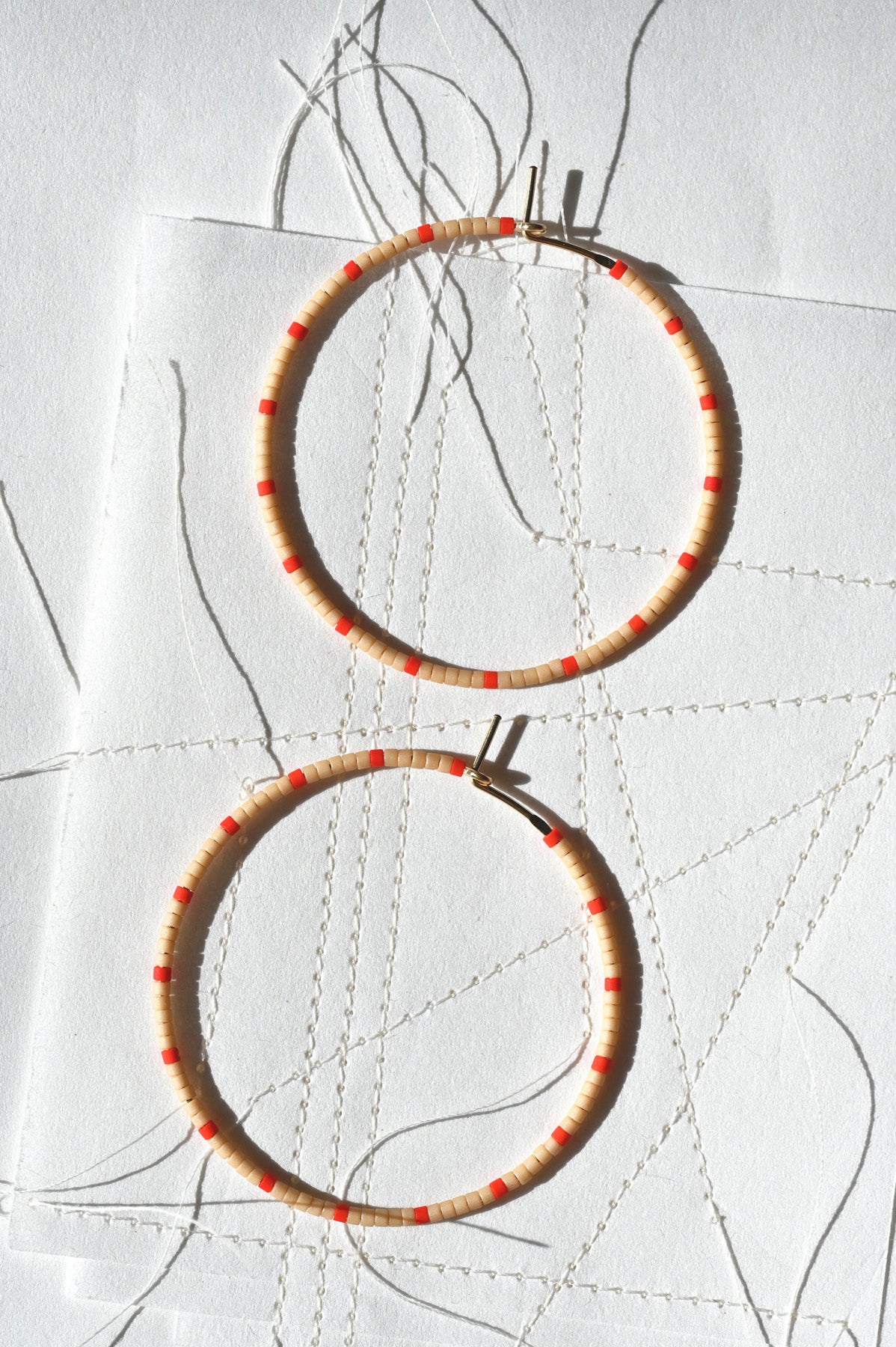 Large Blush and Red Dipsea Hoop Earrings at Abacus Row Handmade Jewelry
