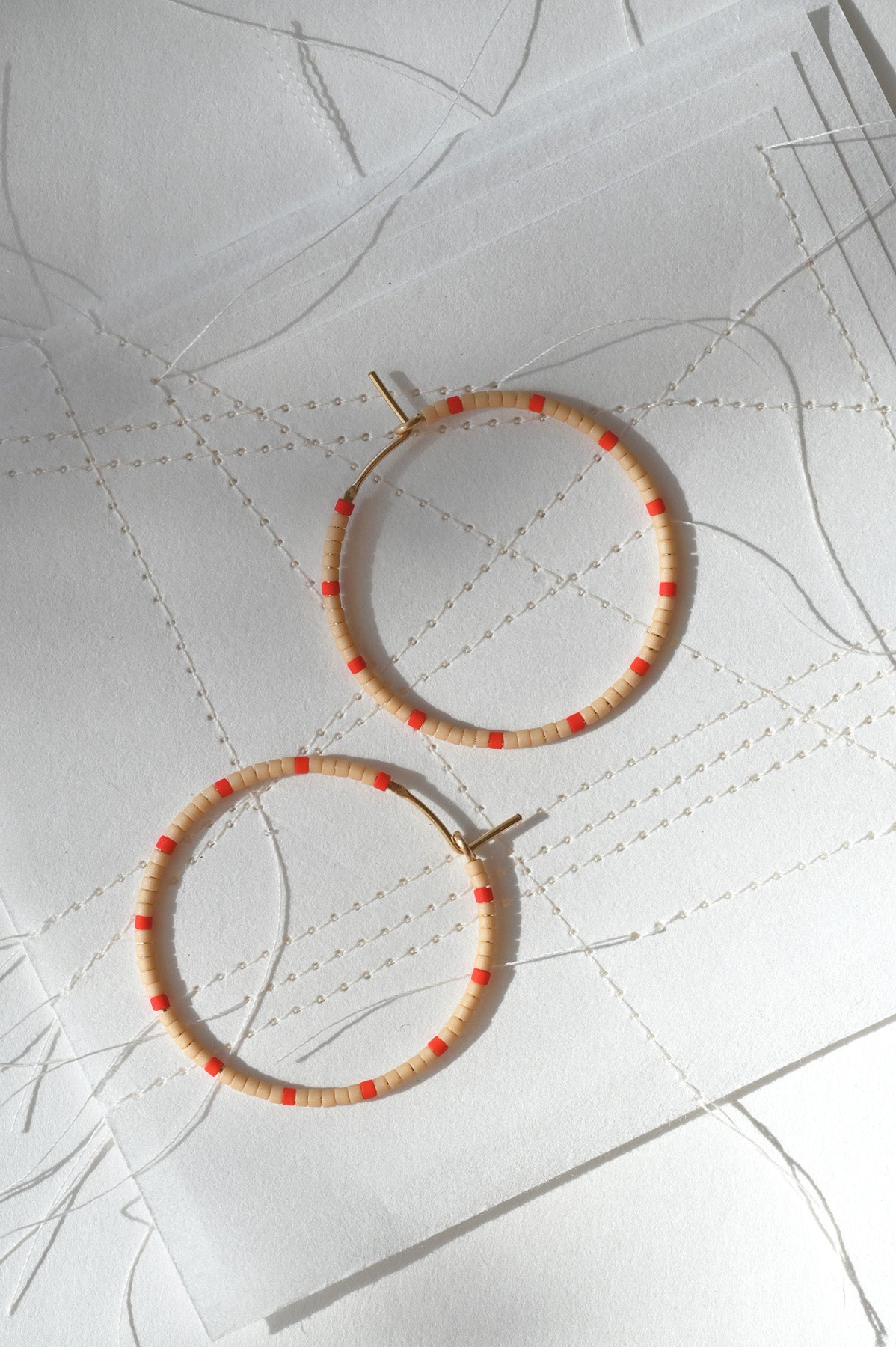 Small Blush and Red Dipsea Hoop Earrings at Abacus Row Handmade Jewelry