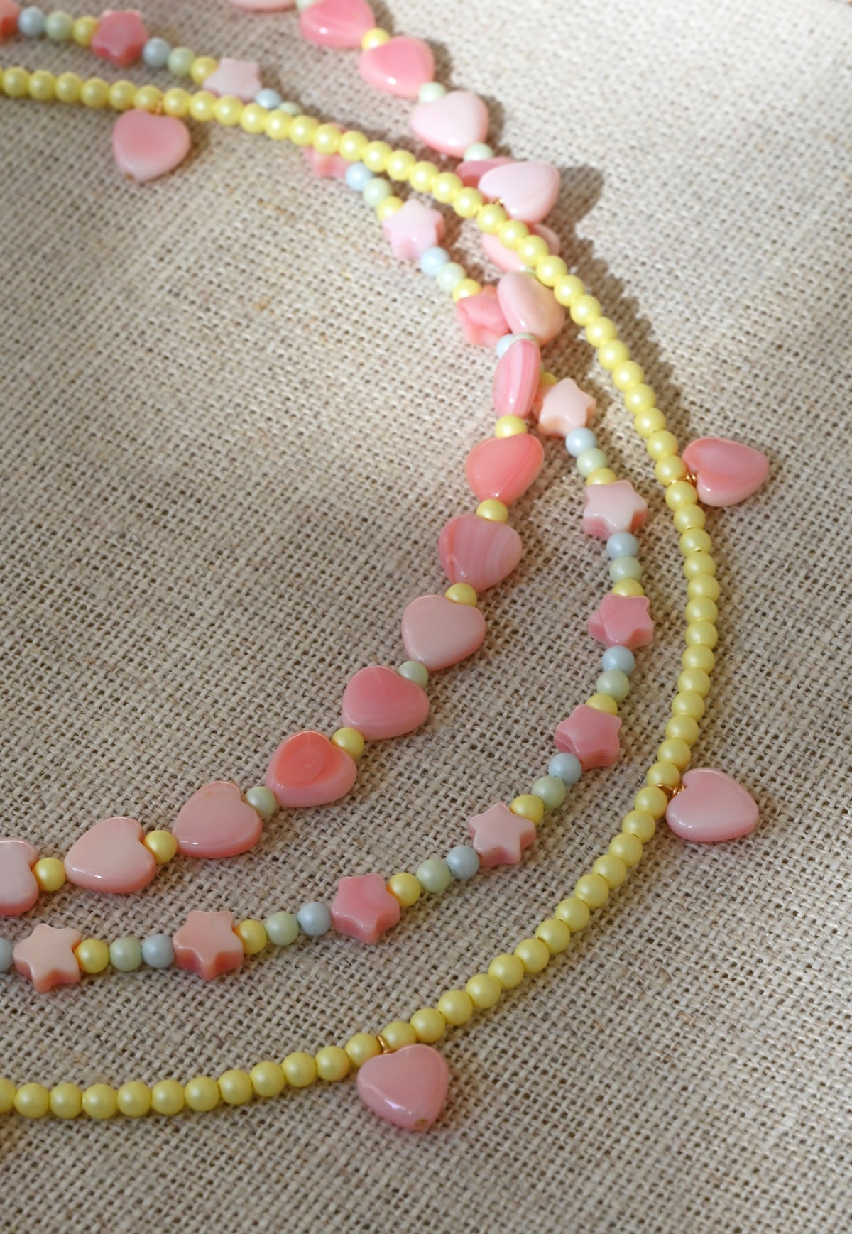 Styled Details of the Dream Cloud Star Rainbow Necklace by Abacus Row Handmade Jewelry