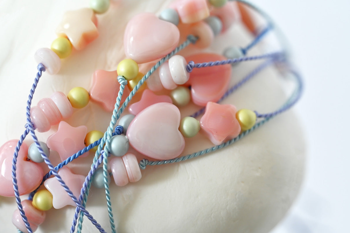 Assorted Dream Cloud Wishing Charms Bracelets on Pillows by Abacus Row Handmade Jewelry