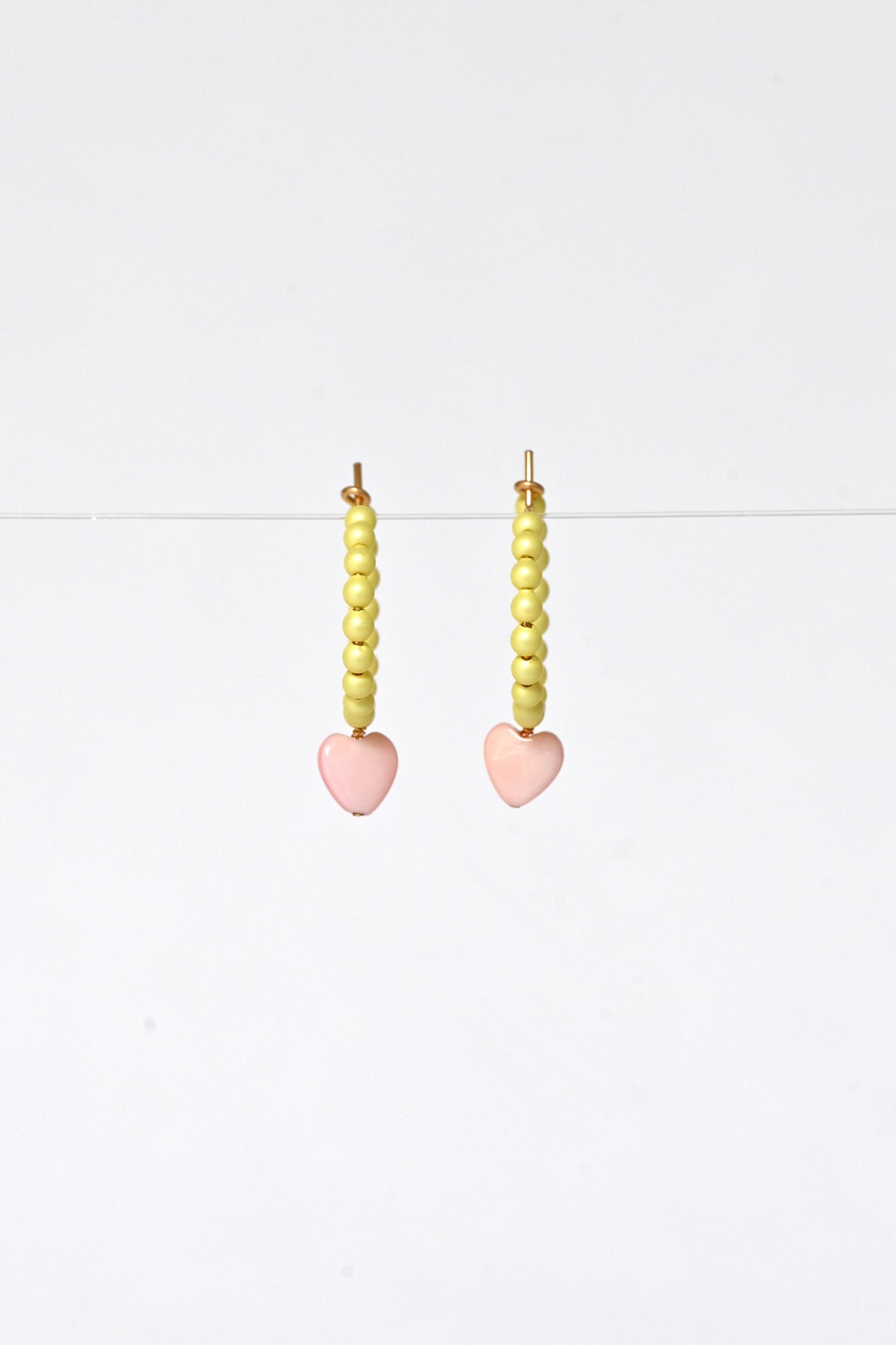 Front View of the Dream Cloud Yellow Wishing Heart Earrings by Abacus Row Handmade Jewelry