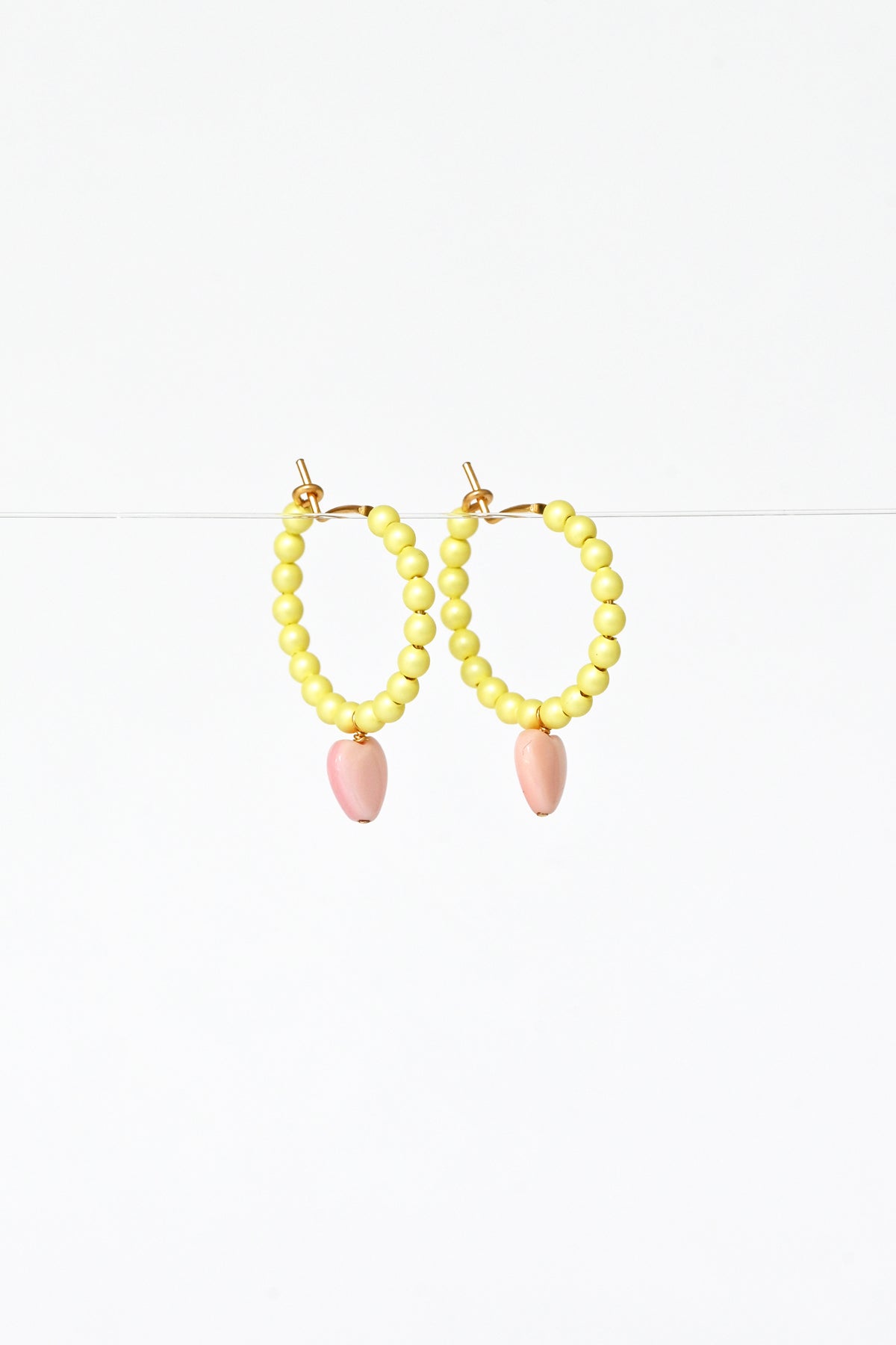 Side View of the Dream Cloud Yellow Wishing Heart Earrings by Abacus Row Handmade Jewelry