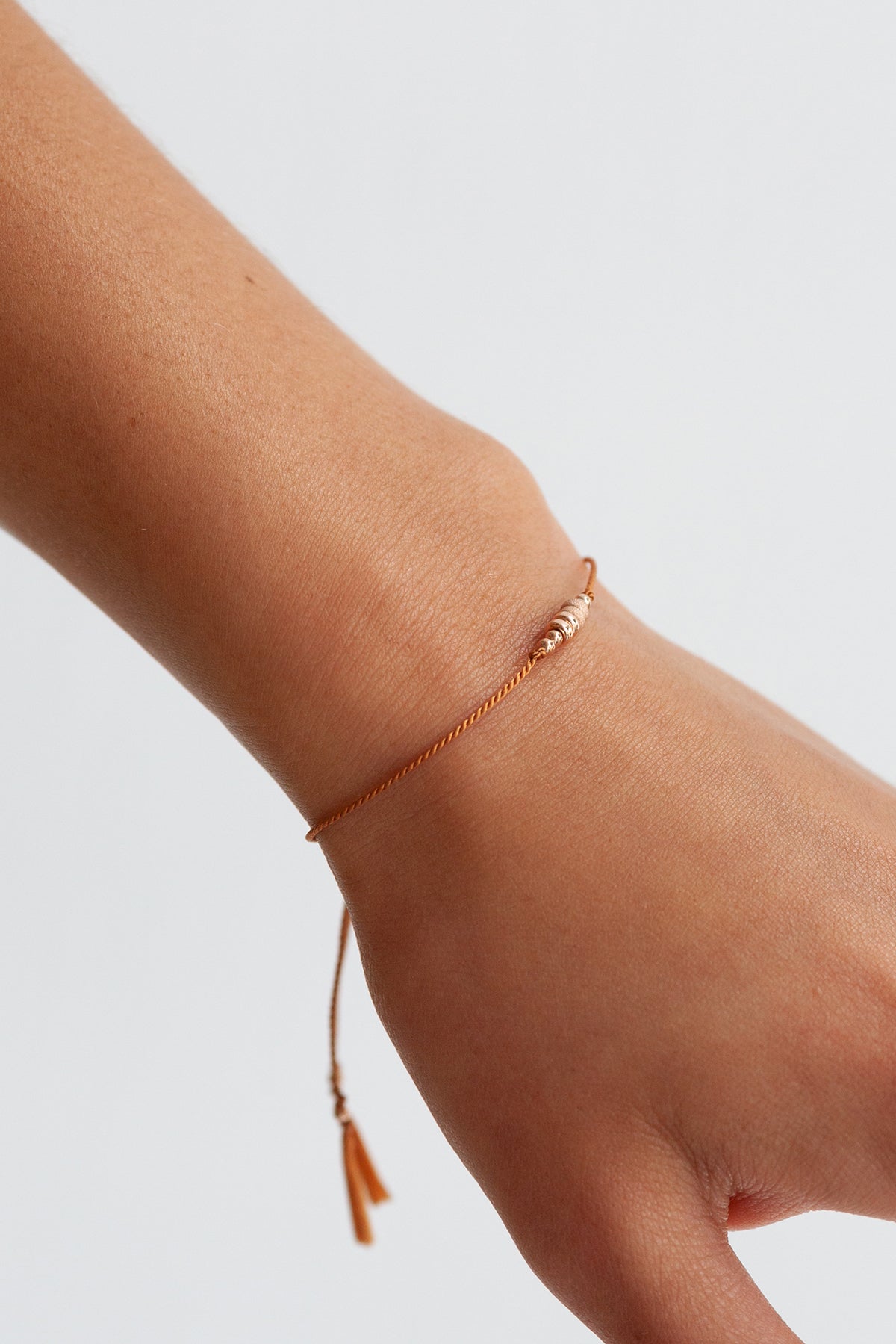 Friendship Bracelet No.5 in Clay on model by Abacus Row Handmade Jewelry