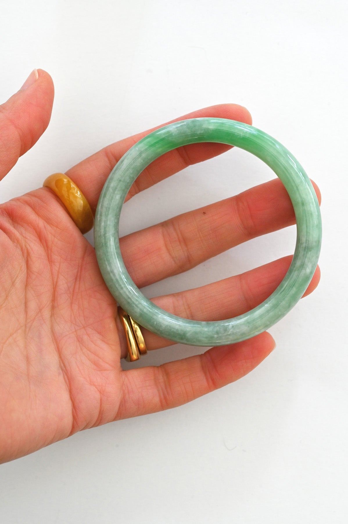 Mai Jade Bangle No.30 in hand at Abacus Row Handmade Jewelry