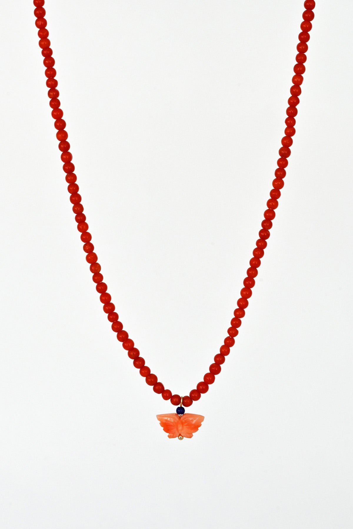 Mai Coral Butterfly Necklace detail at Abacus Row Handmade Jewelry