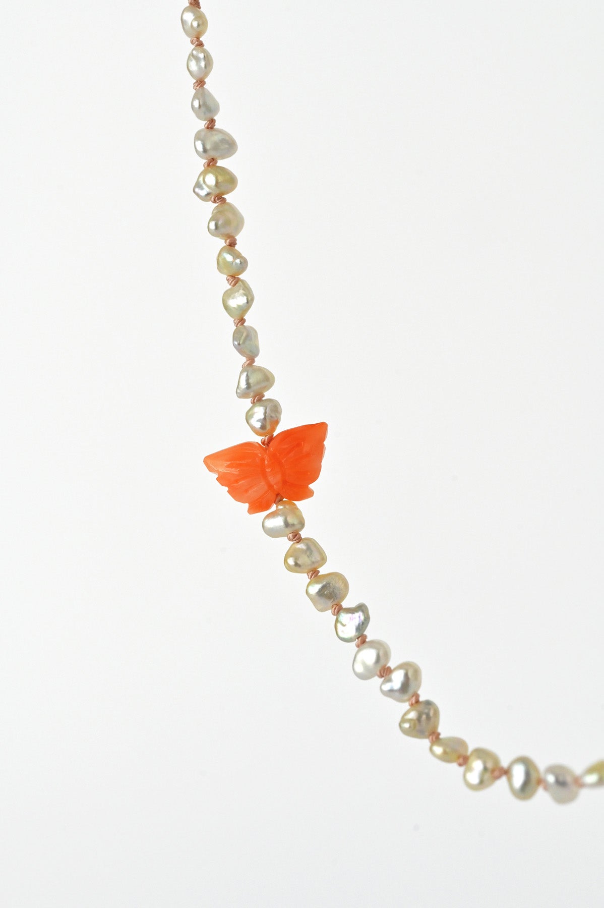 Mai Pearl Necklace with Butterfly close up at Abacus Row Handmade Jewelry