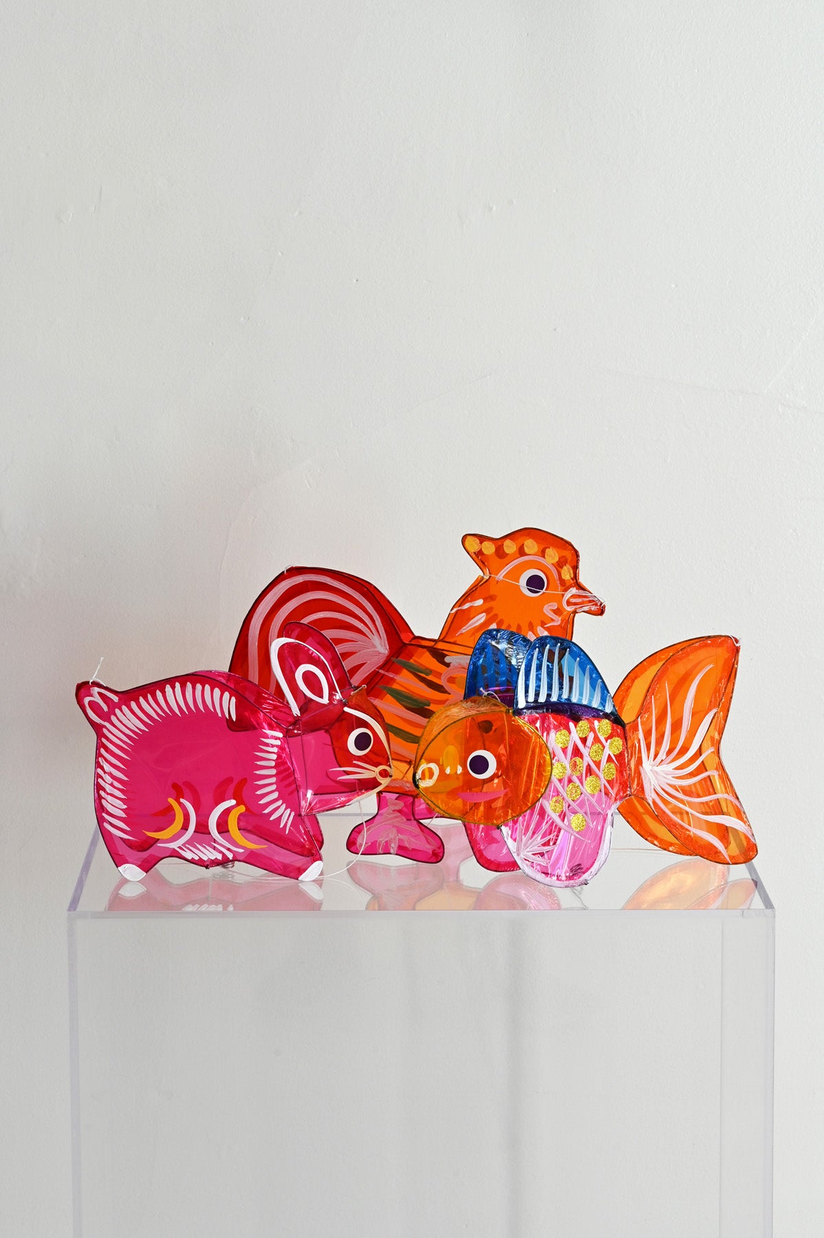 Small Rooster and Bunny and Fish Lantern at Abacus Row Handmade Jewelry