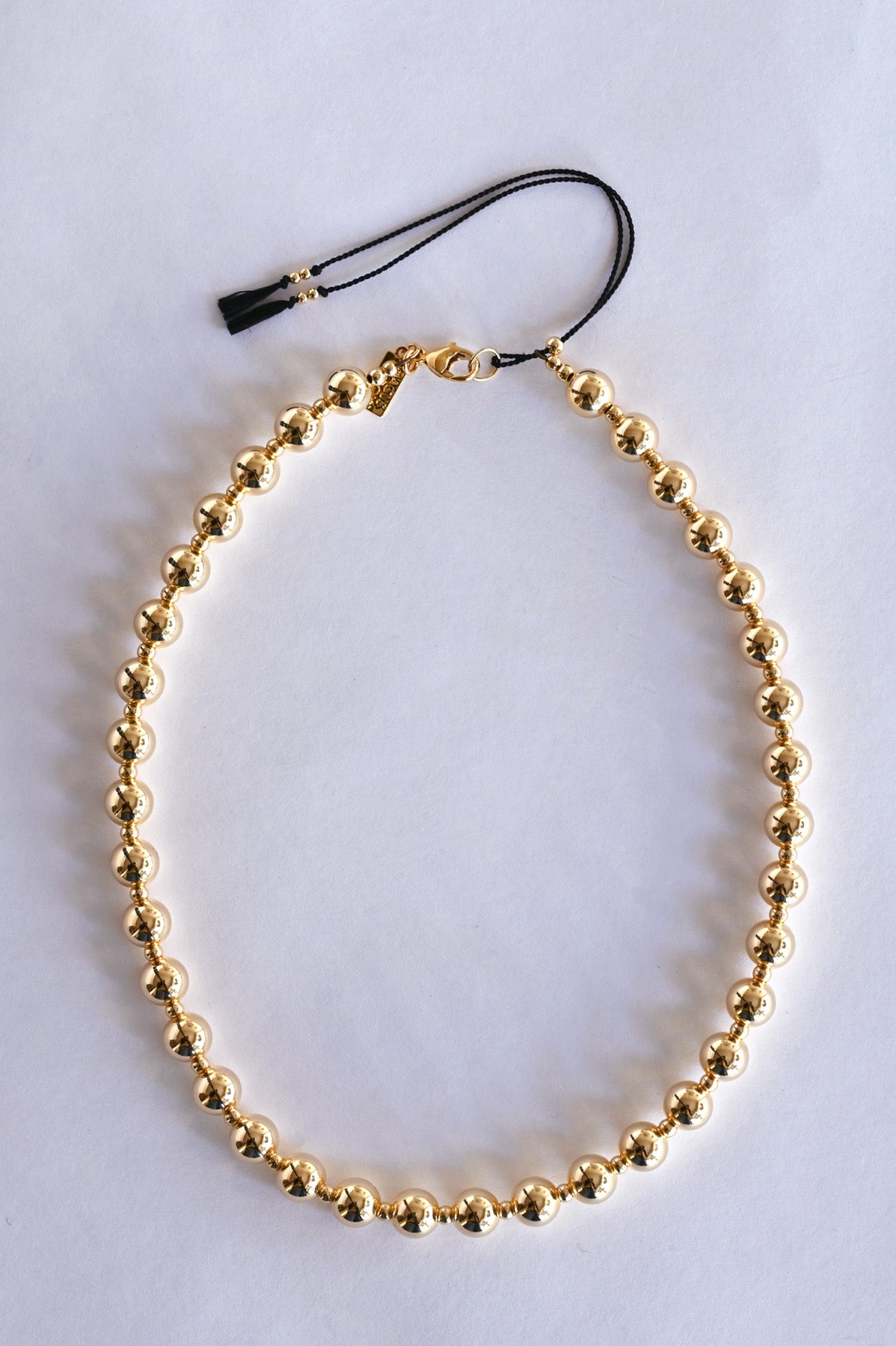 Moon Sun Necklace with Black Tassels by Abacus Row Jewelry