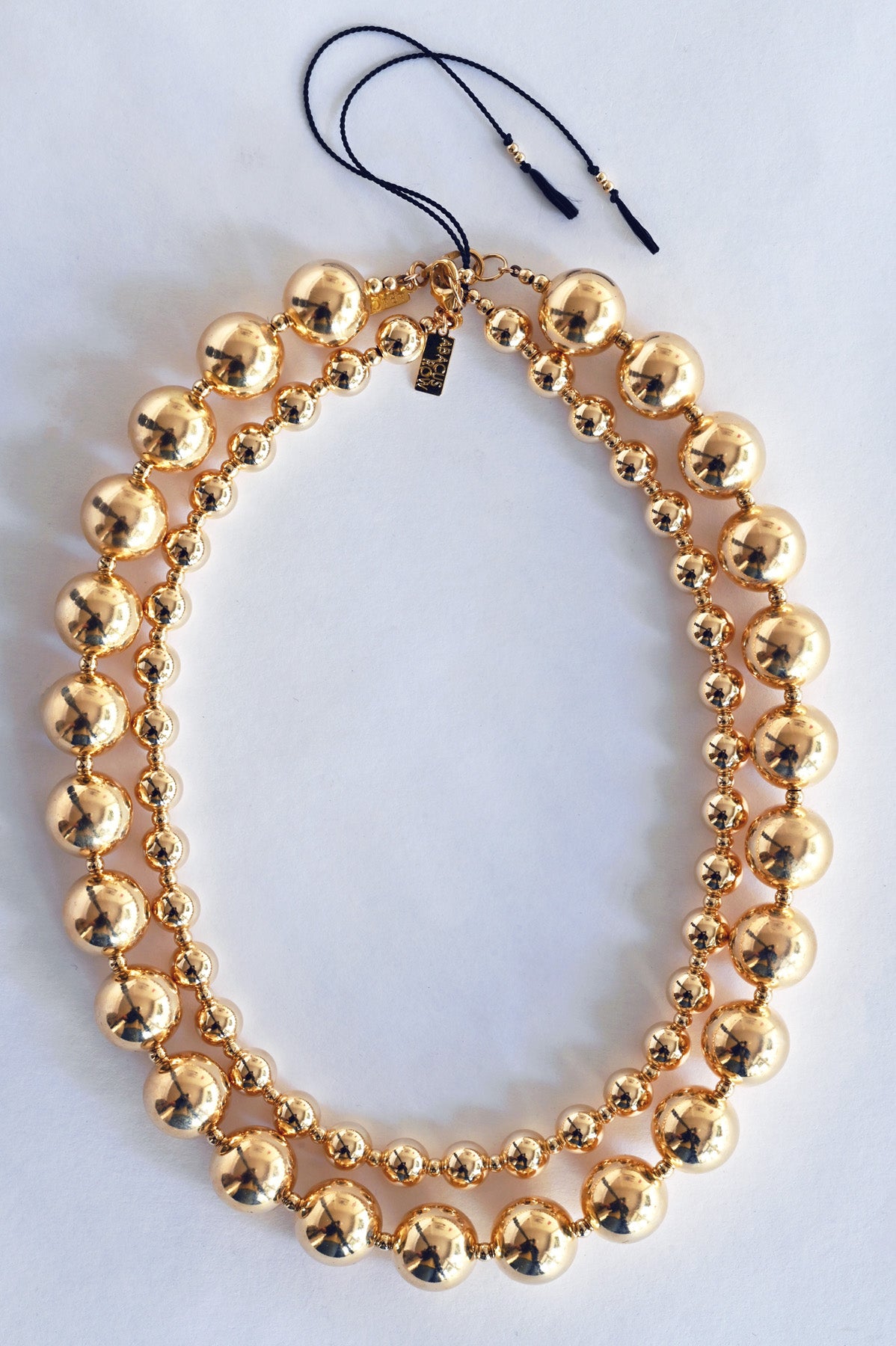 Moon Sun and Yuan Yuan Necklaces with Black Tassels by Abacus Row Jewelry