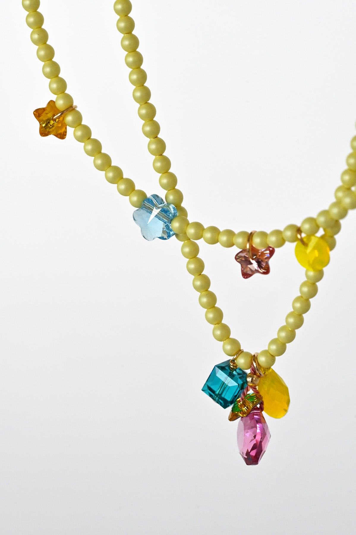 Moon Drops No1 and Lucky Charms Necklaces by Abacus Row Handmade Jewelry