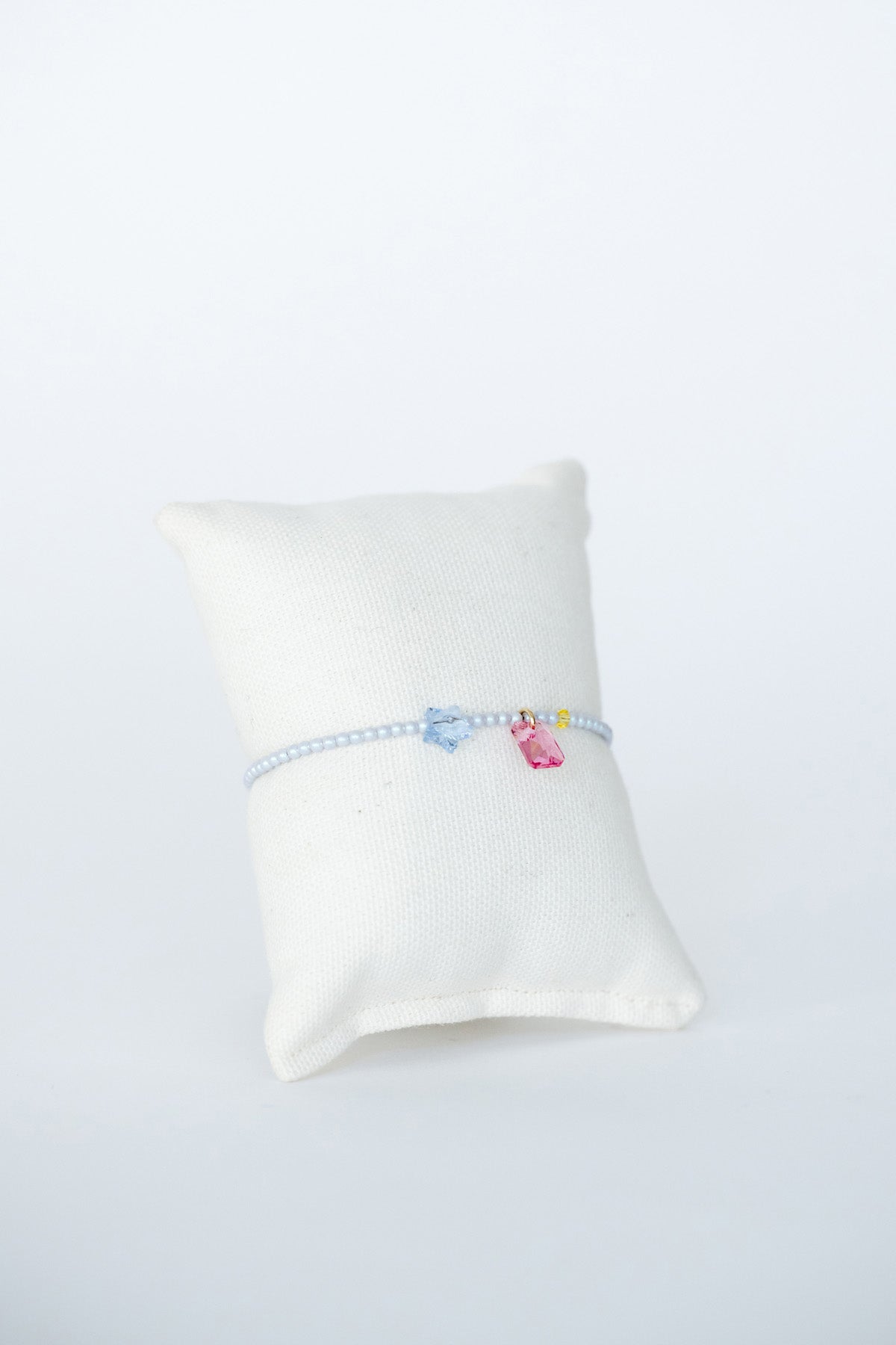 Stardust Bracelet No.1 on pillow at Abacus Row Handmade Jewelry