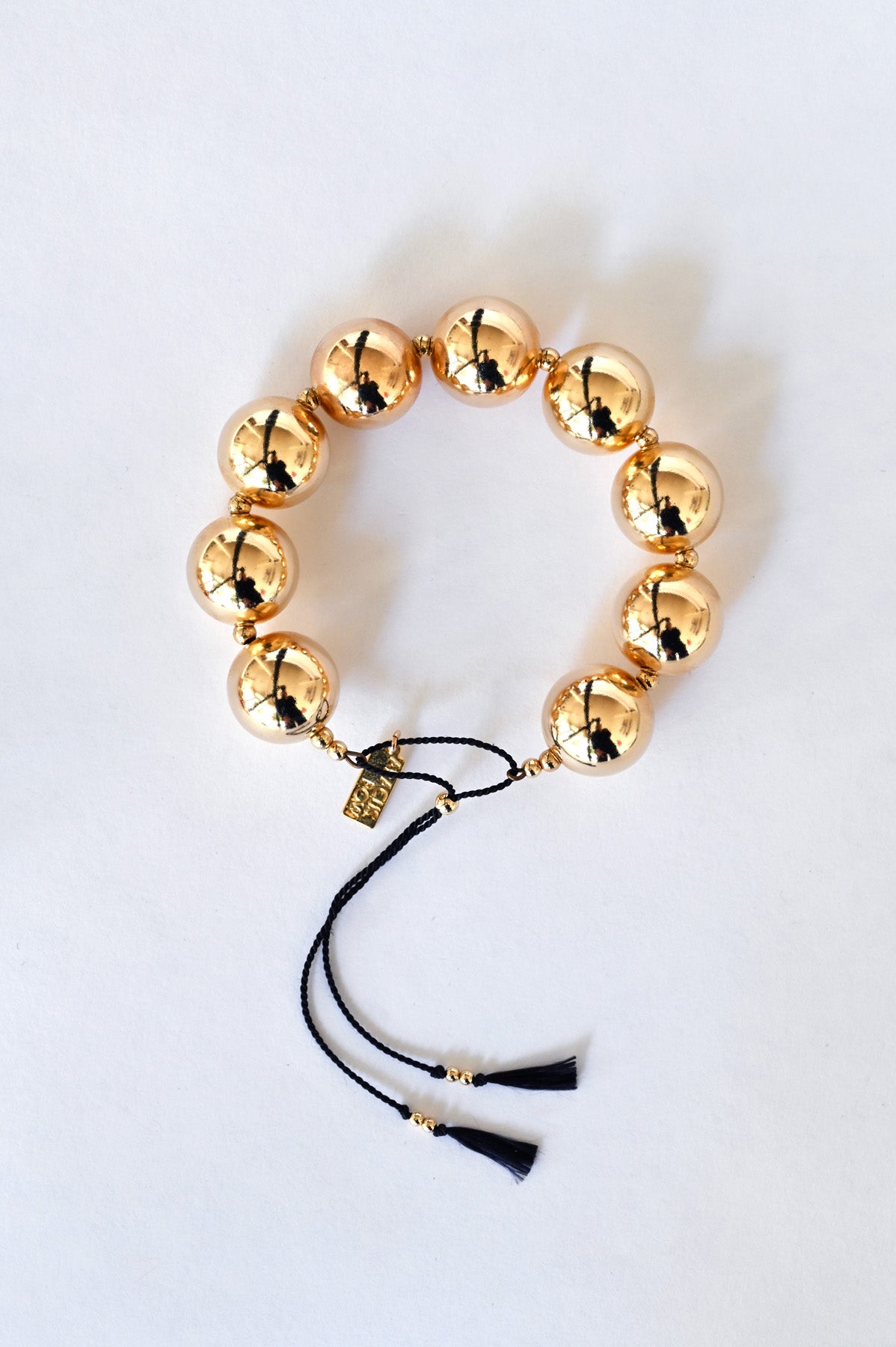 Yuan Yuan Bracelet with Black Tassels by Abacus Row Handmade Jewelry