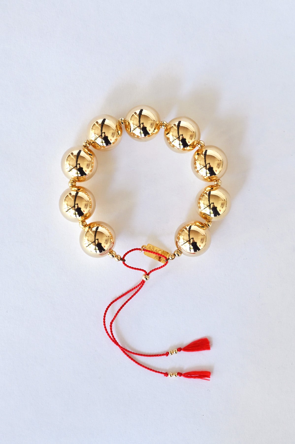 Yuan Yuan Bracelet with Red Silk Cord by Abacus Row Handmade Jewelry