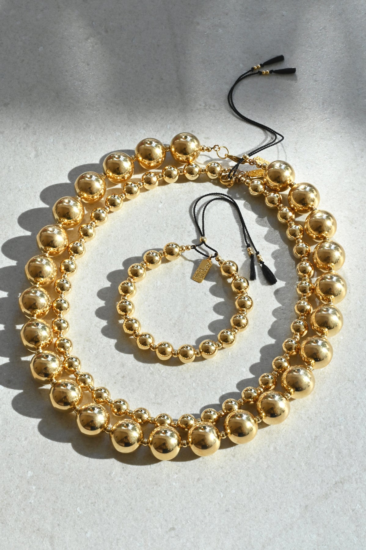 Yuan Yuan Collection pieces with Black Tassels by Abacus Row Handmade Jewelry