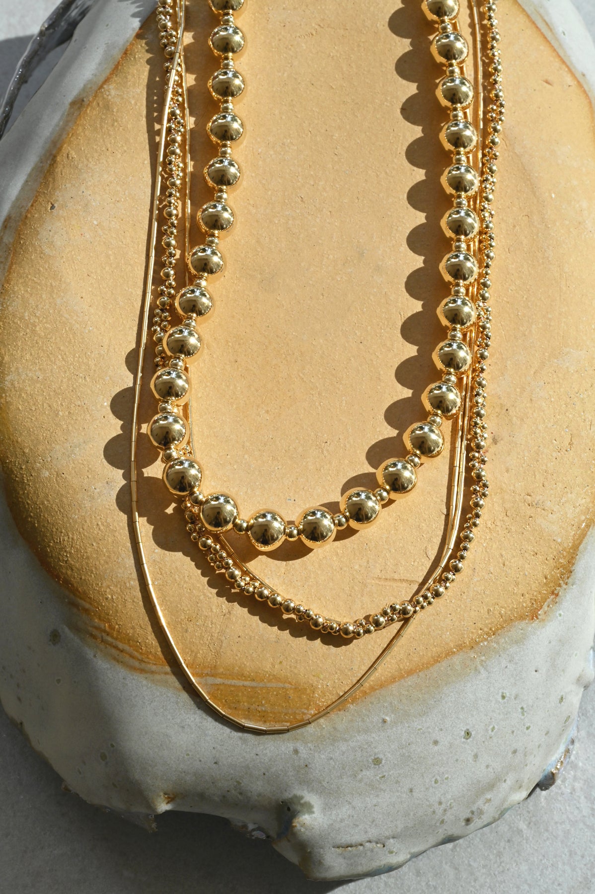 Moon Sun Necklace with Black Tassels with Zeta Necklace by Abacus Row Jewelry