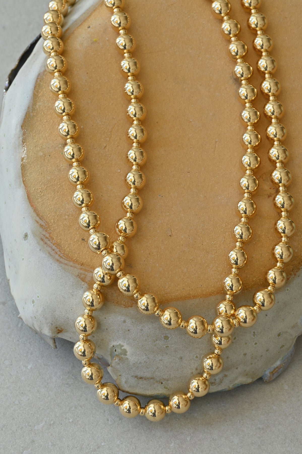 Close up Wrapped Long Moon Sun Necklace by Abacus Row Handmade Jewelry