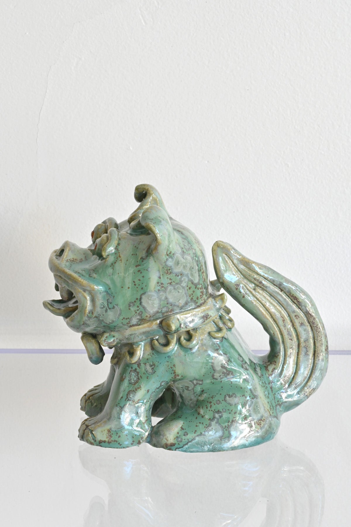 Left Side of Red Garnet Eyed Mini Fu Dog by Ahn Lee at Abacus Row Handmade Jewelry
