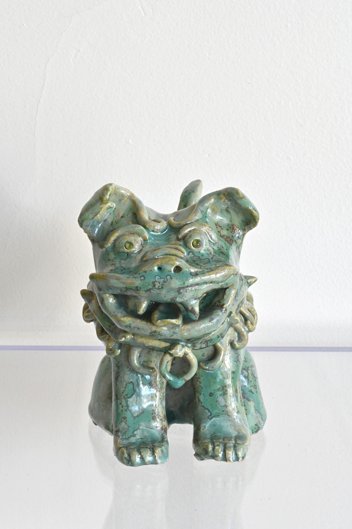 Front of Peridot Eyed Mini Fu Dog by Ahn Lee at Abacus Row Handmade Jewelry