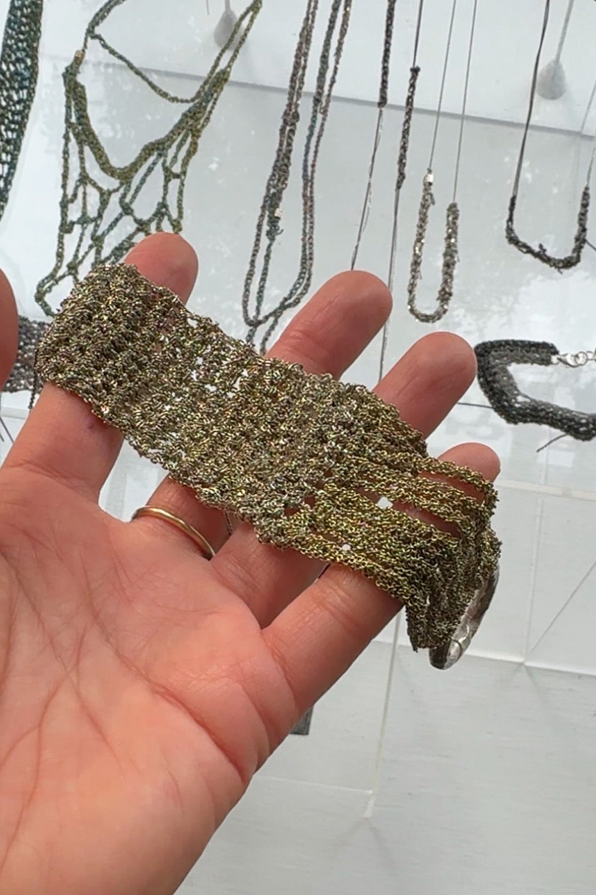 Detail in Hand of The Buxom Bracelet by Arielle de Pinto at Abacus Row